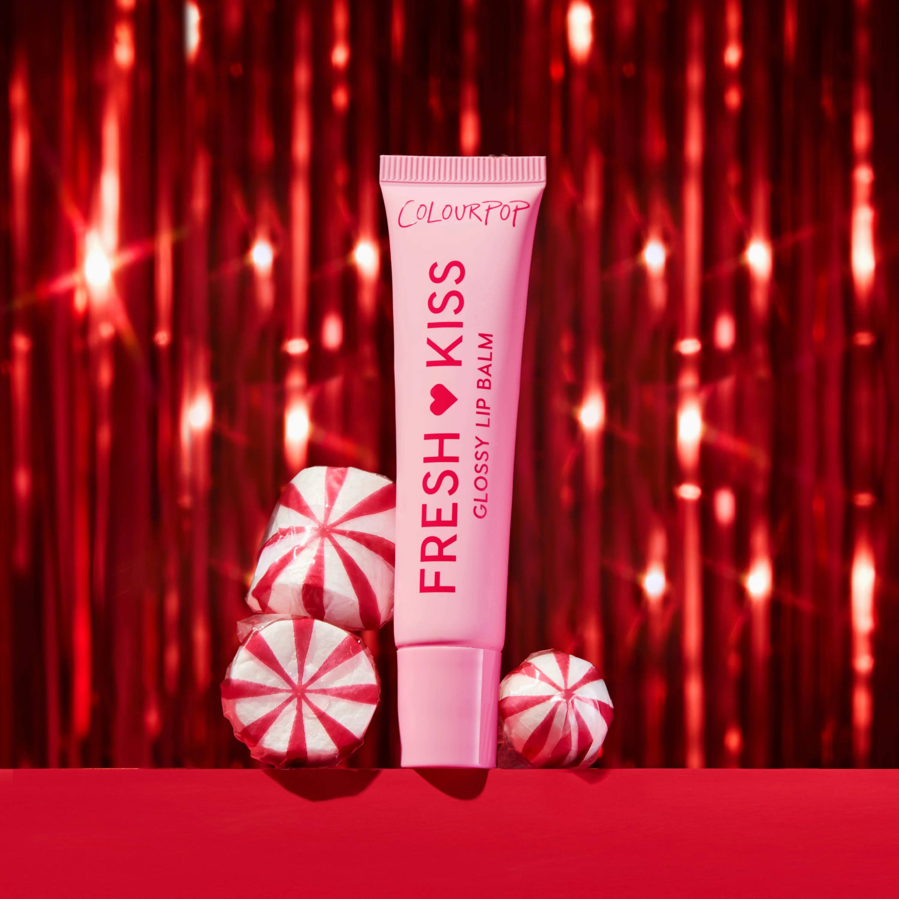 ColourPop®: Shop Limited Edition Fresh Kiss Candy Cane - Sheer Peptide Glossy Lip Balm | Colourpop