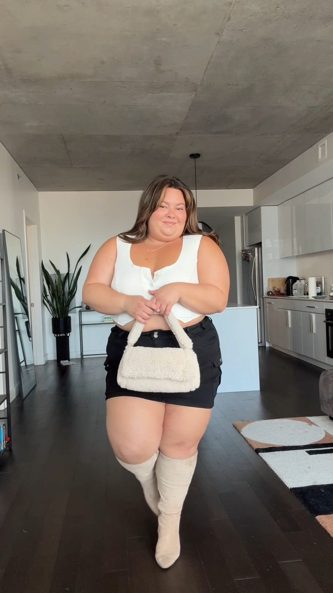 Plus size summer to fall outfit 
〰️ cropped vest: what Lo Wants size 2X
〰️ plus size cargo mini skirt: Amazon size 3X 
〰️ wide calf suede boots: torrid (sold out, but similar linked below) 
〰️ fuzzy bag from Primark (similar linked below)
〰️ Gray sweatpants: Aerie XXL

#LTKVideo #LTKPlusSize #LTKMidsize