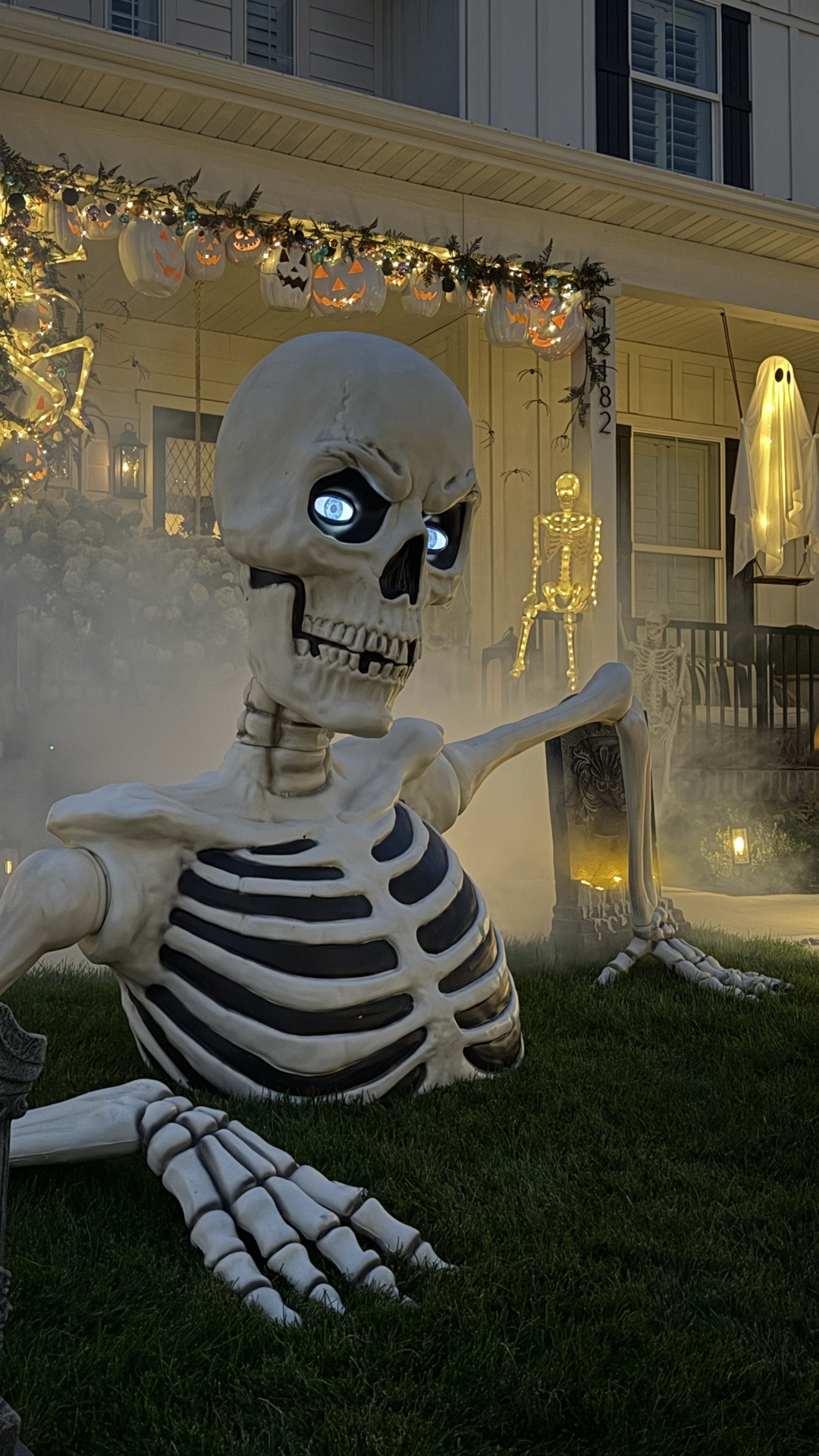Halloween front porch decor. My skeleton is sold out but I linked a similar one!