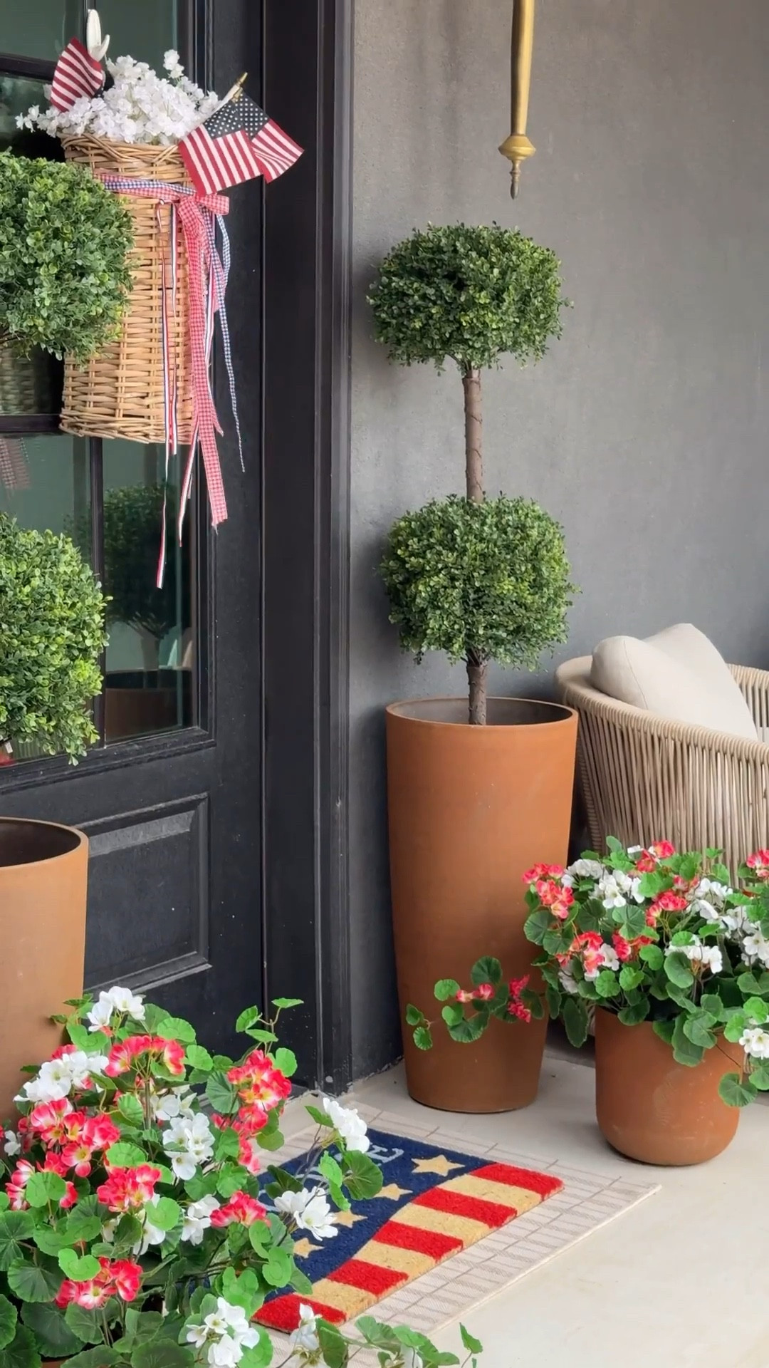 Americana but make it elevated 🇺🇸✨

I wanted this porch to feel classic without looking overly themed… so I layered in desert neutrals, different textures, and just enough red, white, and blue to make it feel like summer. 

These pieces from @Plow&Hearth are actually made for outdoor use not for just looking pretty and the combination of faux plants is what really pulled everything together! 

#LTKHome #LTKSeasonal