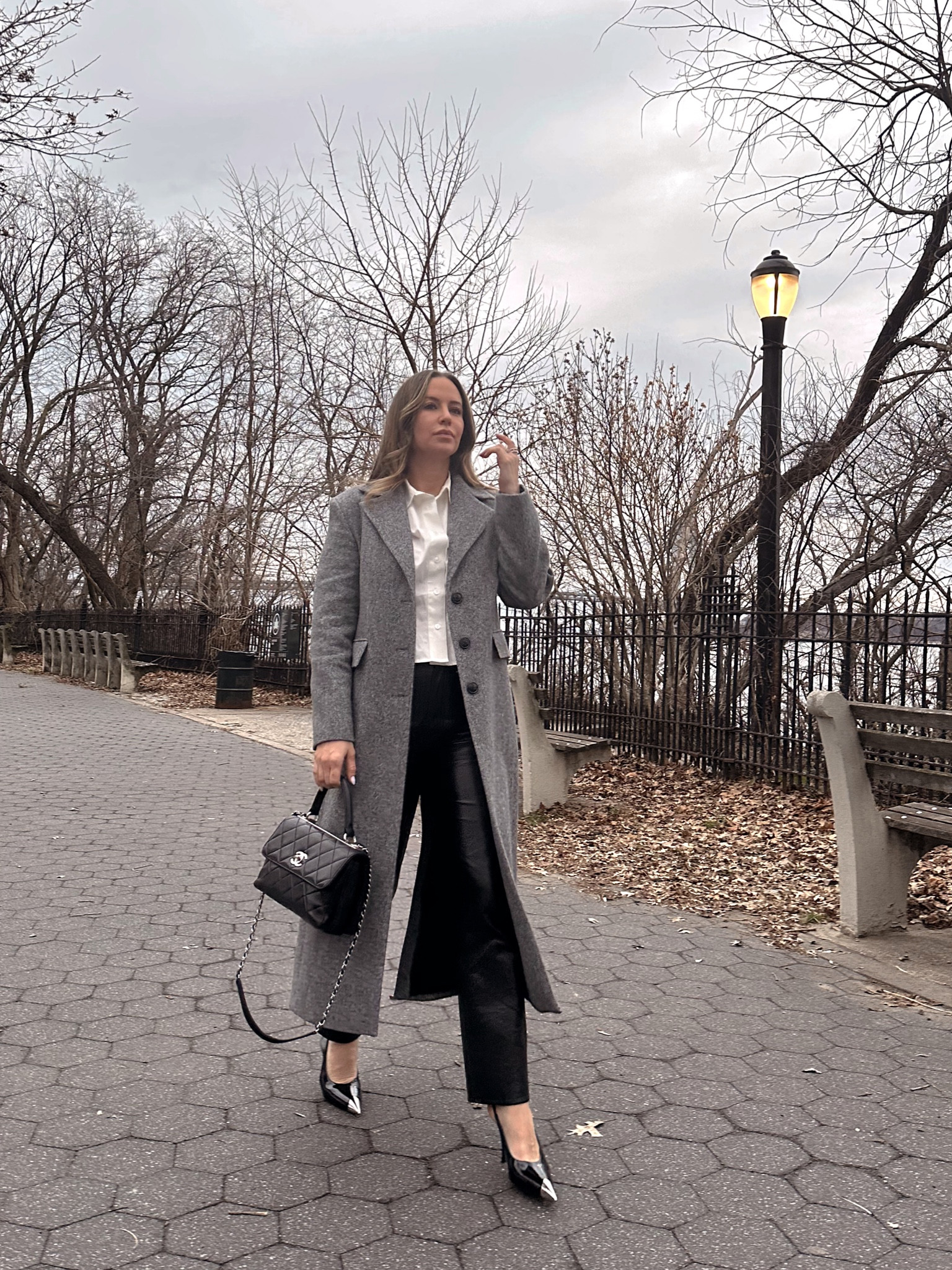 Sizing details: top: small (runs a little big), leather pants TTS, coat wearing a small (runs a little large). Shoes are Saint Laurent. Handbag is the Chanel Trendy.