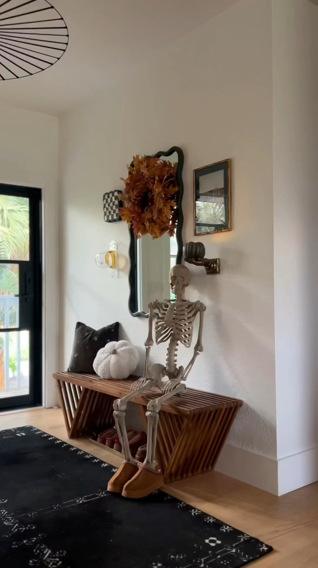 Halloween entryway decor! Stone skeleton was a spray paint DIY!!! #meabdmrjones 

#LTKFindsUnder50 #LTKHome #LTKFindsUnder100