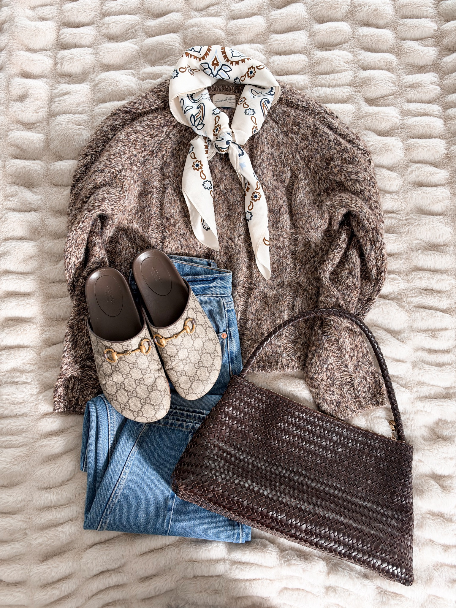 dress up your everyday jeans  with a chunky sweater and fun scarf 🍂 Finished with comfy flats and a bag you can take anywhere.

Comment LINK and I’ll send you the details.
