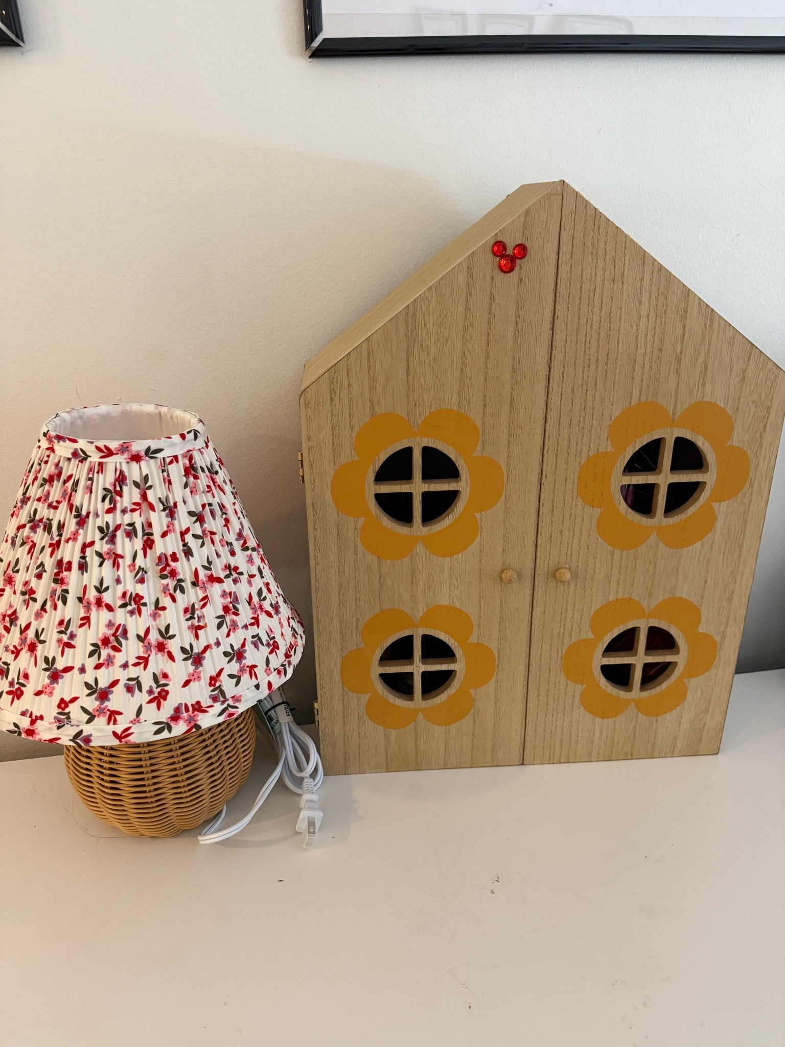 Cute new playroom additions ! The house is a little shelf and love this little lamp with the floral shade from Target
My girls put the Mickey gem on😂


Target
Pillowfort
Girls bedroom decor 


#target