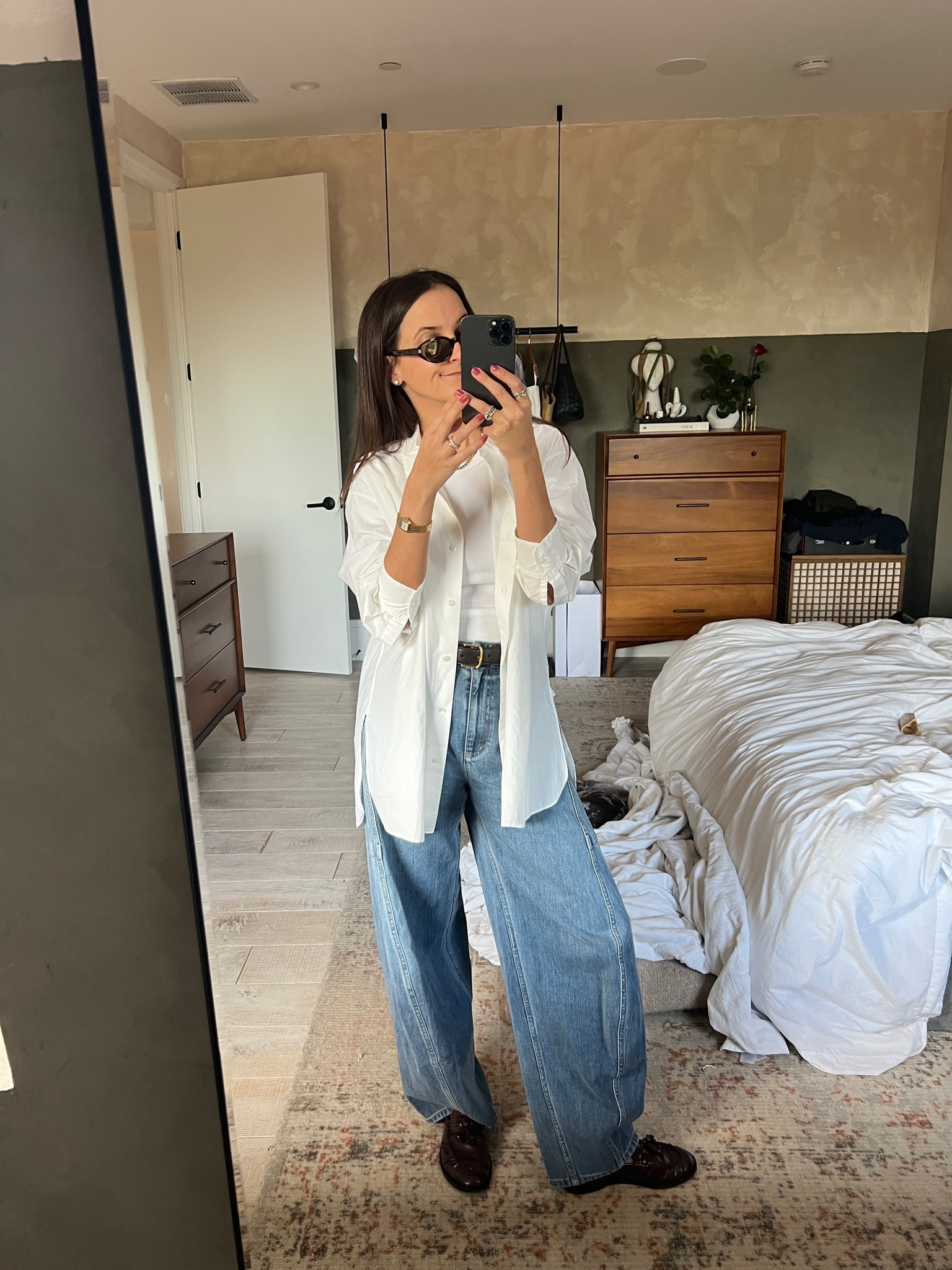 it’s giving kendall Jenner 
top: runs large - wearing a small
Jeans: run large - sized down, 26. buy true size for a lower sit on the hip/baggier 
Tshirt: runs small - wearing a medium 

#LTKstyletip #LTKFind