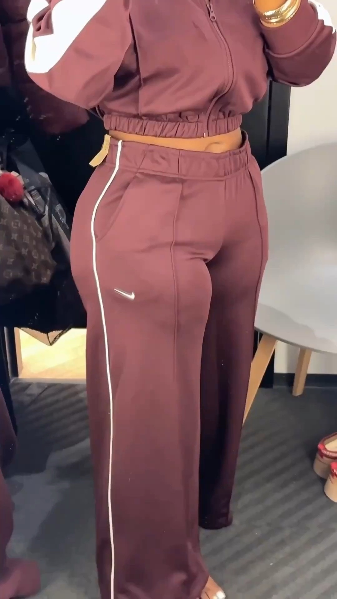 Obsessed with this set lately 🤎✨
Sporty but still feels put together — comfy, flattering, and easy for everyday wear or travel days.

Wearing the Nike Sportswear cropped track jacket + mid-rise wide-leg pants.
Size small in both. Linked the exact set 🤍

#ltkactive #ltkstyle #nikesportswear #athleisurewear #everydaylook #sportychic #widelegpants #traveloutfit #casualchic #comfystyle #ootd #ltkootd #ltkpetite


#LTKSeasonal #LTKdayinmylife #LTKvlog