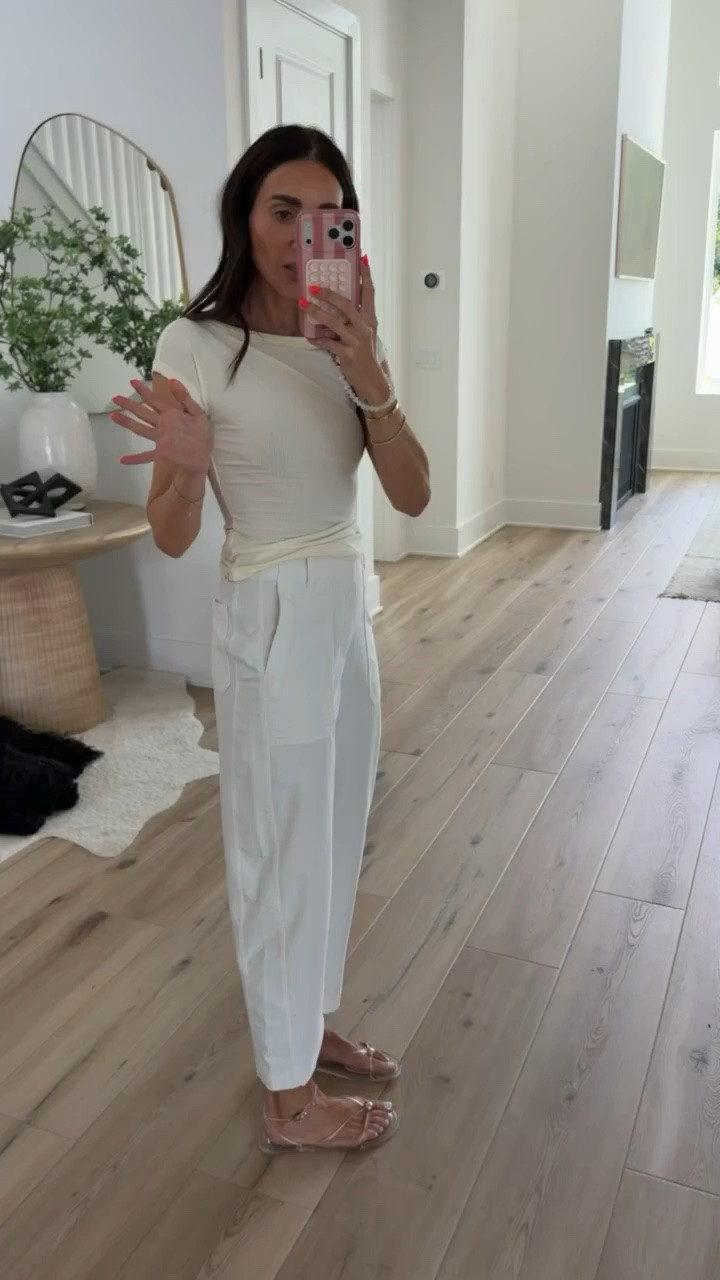 These pants have quietly become one of the most worn pieces in my closet. I own them in multiple colors because the fit is that good. The lightweight fabric drapes beautifully, the pleated front gives them a more elevated look, and they’re comfortable enough to wear all day without feeling restrictive.

Size 0

white pants, tailored pants, summer pants, everyday outfit, workwear, neutral style, capsule wardrobe, lightweight pants, versatile fashion, closet staples, annabrstyle

#LTKootd #LTKSeasonal #LTKActive