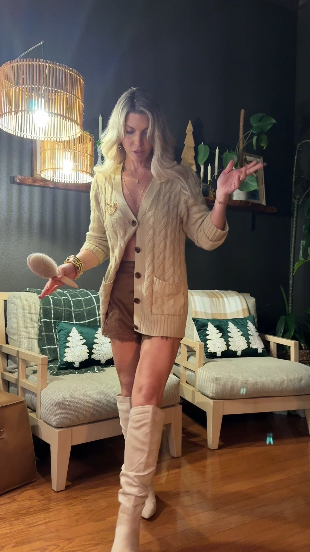Viral silk shorts from Amazon paired with my thrifted sweater and my Amazon favorite boots
I’m wearing an xs in the shorts, they run big. 

#LTKOver40 #LTKHoliday #LTKootd