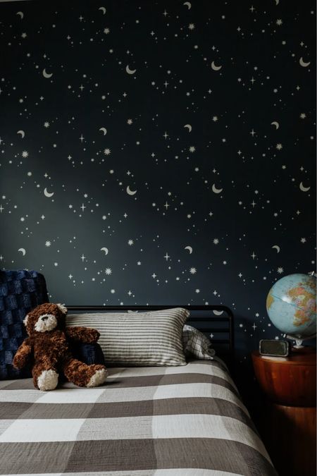 Boys room decor, navy blue room, with wall stencil, globe and space theme, gingham quilt 

#LTKkids #LTKhome #LTKfamily