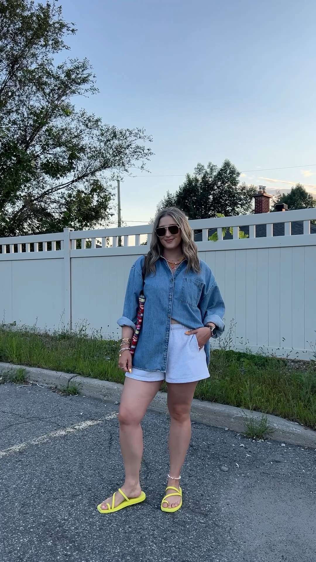 Easy summer outfit! Wearing L in the denim shirt (Canadian link under “similar products”). Also wearing L in the sweat shorts. I’m a 9.5-10 shoe and wear a 10 in the crocs toe loop sandals. Canadian bag link is also under “similar products”

#LTKsummer #LTKsale #LTKmidsize