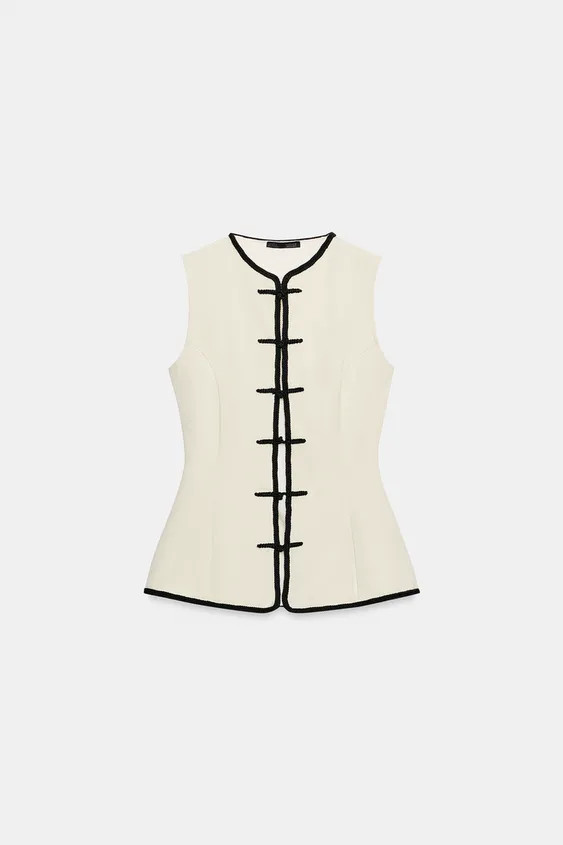 Sleeveless round neck top. Contrast piping detail. Front frog fastening closure. | Zara Canada