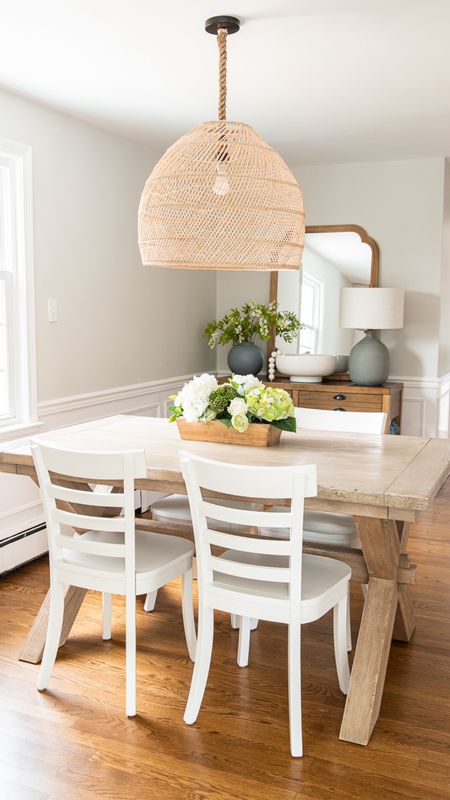 Natural elements, coastal style dining room with Pottery Barn table, white chairs, rattan light fixtures, and more home decor

#LTKfamily #LTKhome