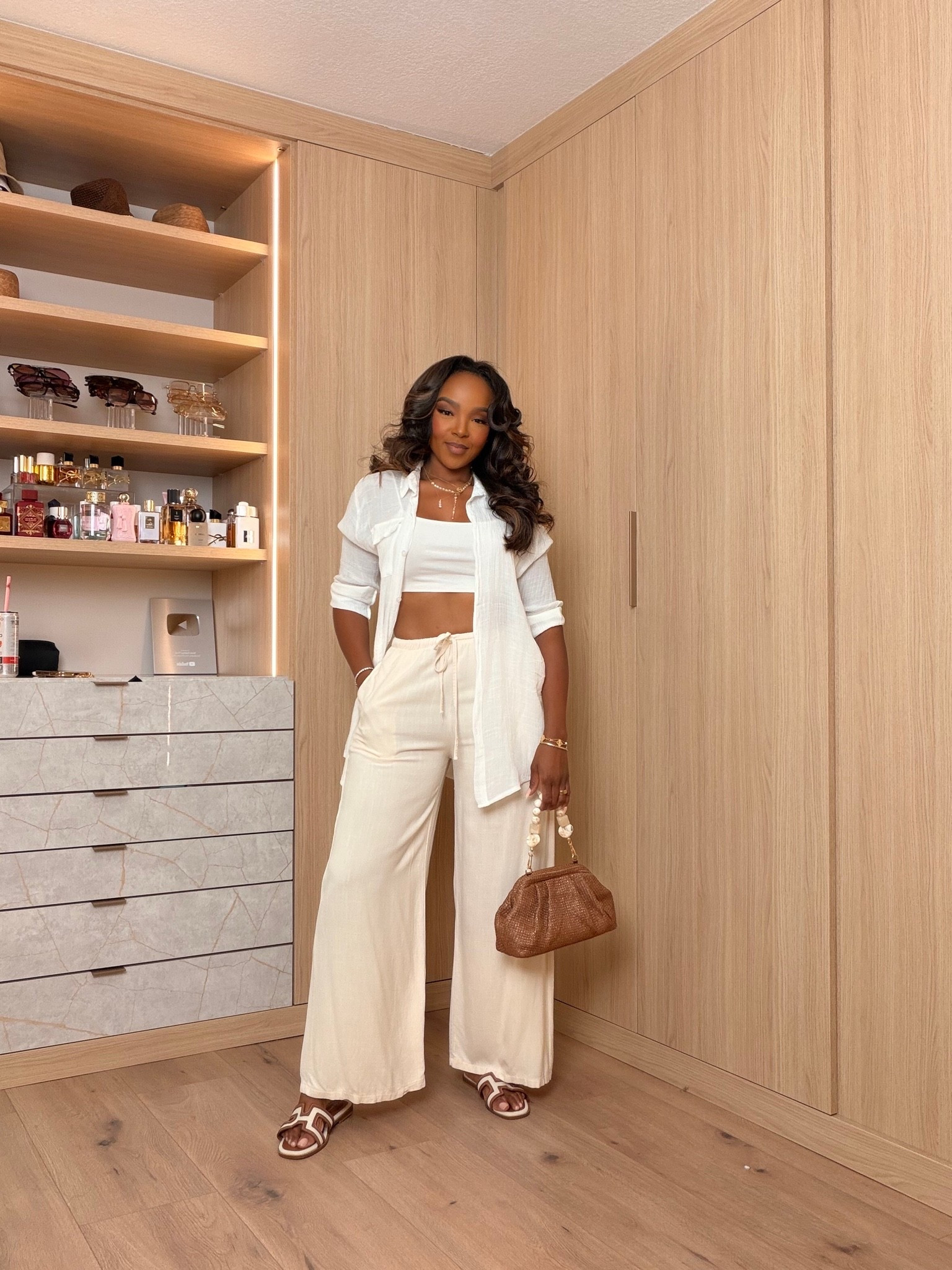 Hi Babes! 🤍✨

Nothing says effortless luxury like a chic monochromatic look! I love how this cream three-piece set feels elevated while still being lightweight and comfortable. It's one of those outfits you'll wear over and over all season long.

✨ Fit Details:
• Cream cardigan
• Matching crop top
• Wide-leg drawstring pants
• Brown woven handbag
• Neutral sandals
• True-to-size fit

☀️ Where to Wear:
• Vacation dinners
• Airport travel days
• Brunch
• Resort wear
• Summer date nights

🤍 Style Tip:
Pair it with rich brown accessories and gold jewelry to give this neutral set a luxe, expensive-looking finish.

Everything is linked below!

xx Kira | IG: KirasFashionFinds

Measurements: 5'4" | 140 lbs | Size Small