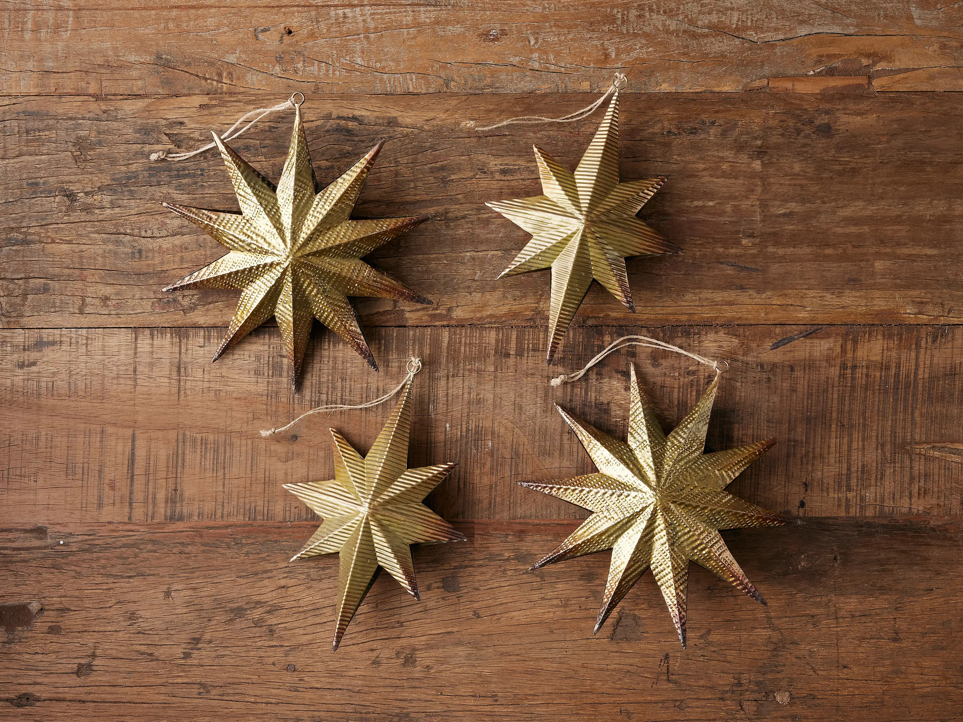 Embossed Star Ornament in Brass (Set of 4) | Arhaus