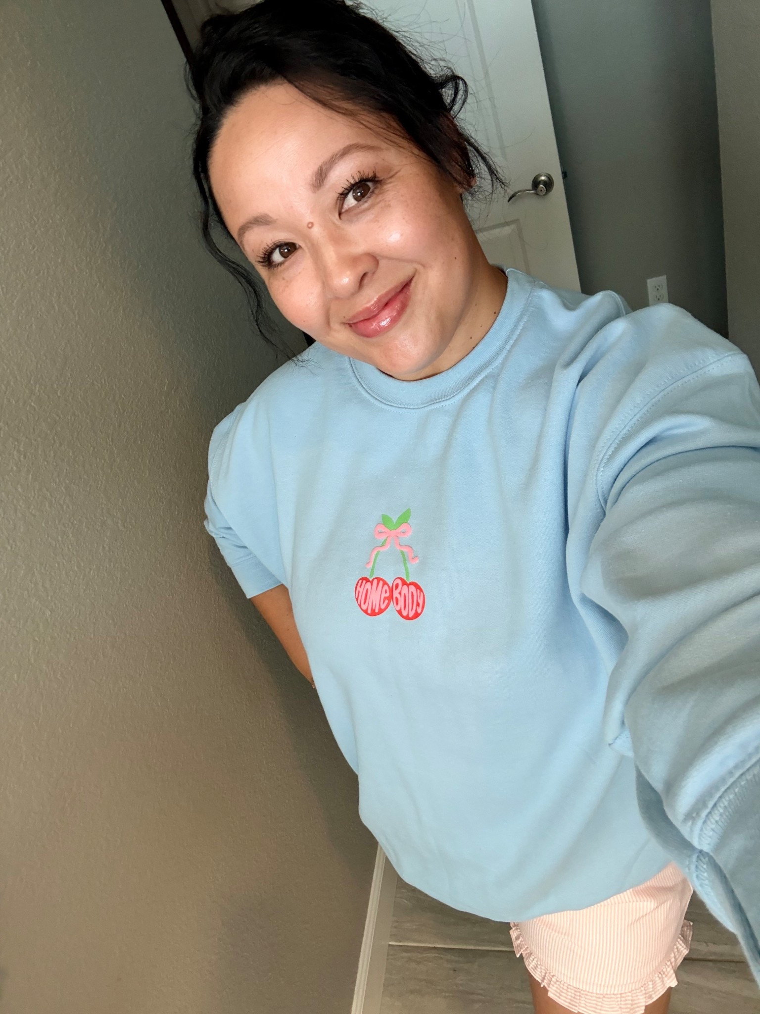 these pink ruffled shorts are 50% off right now!! i’m wearing a size medium💕

my sweatshirt is sold out from @shopstaykation & i’m wearing a size xl

still obsessed with my new crimper💁🏽‍♀️ & busted out my @Fenty Beauty bronzer in “i$land ting” now that i have a little tan going✨

#LTKmomlife #LTKgrwm #LTKootd