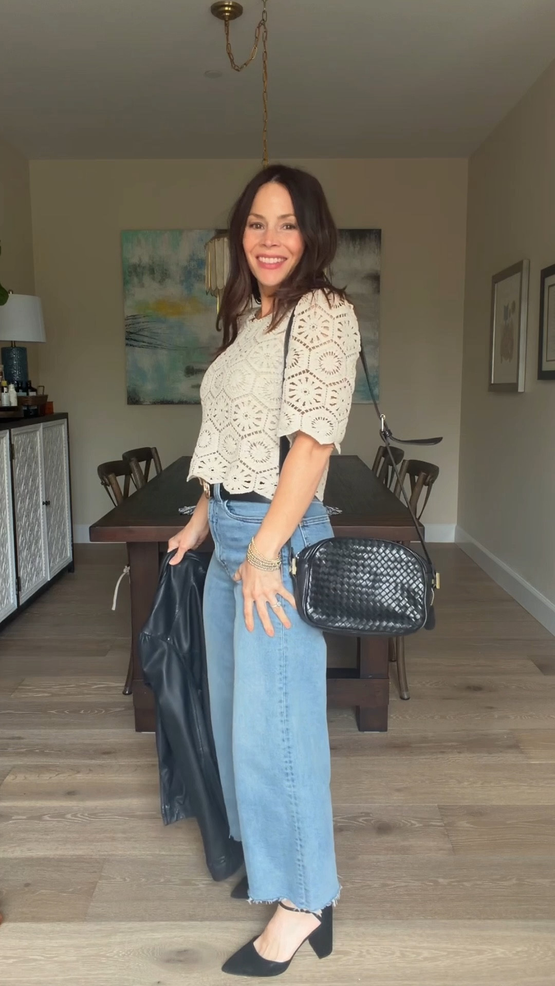 Leather and lace- going out look for a 40+ mom of 2. High waisted jeans, textured top, leather jacket and black accessories 

#LTKOver40 #LTKPetite #LTKootd