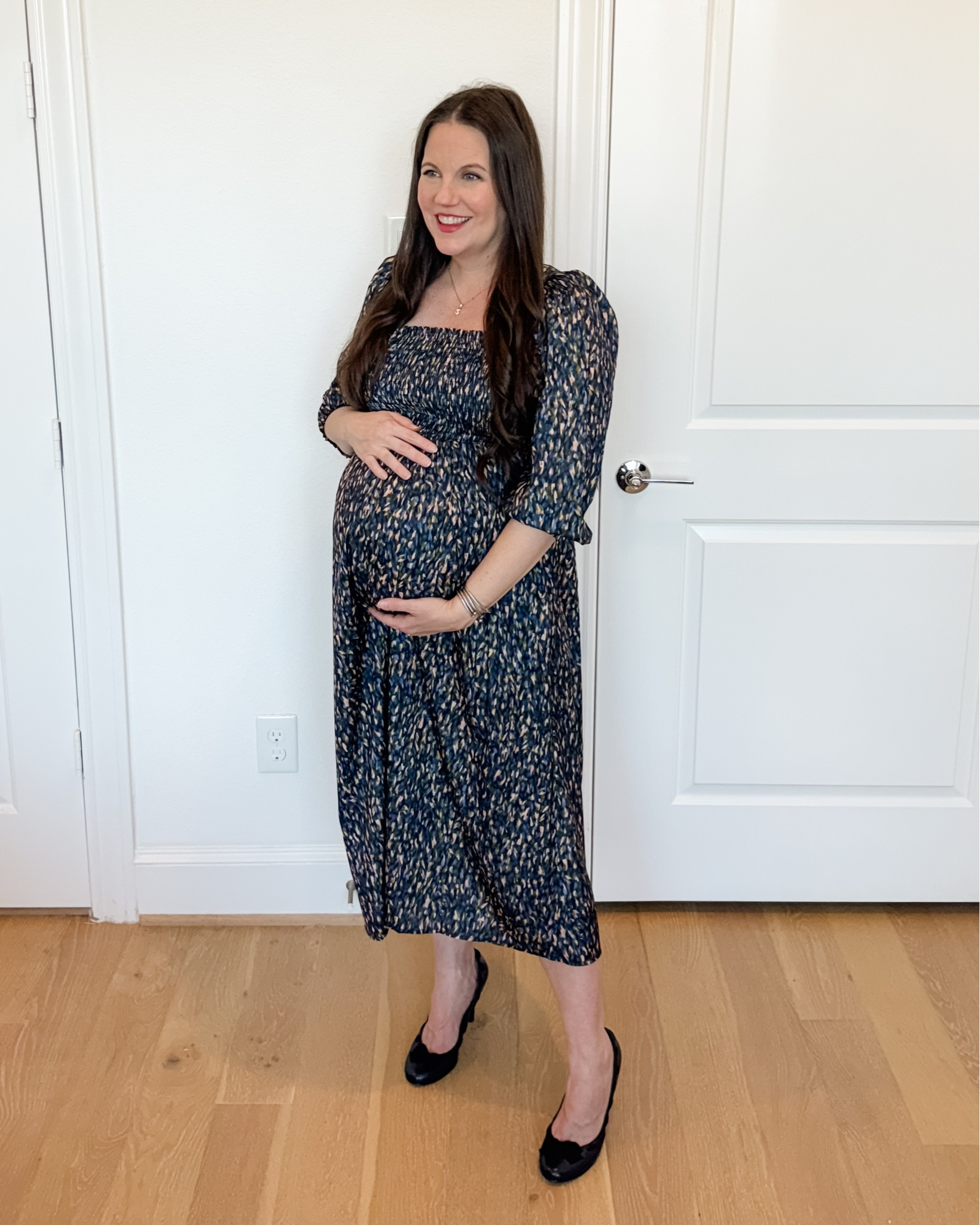 This silky sateen maternity dress with a smocked bodice is one of my favorite pieces for polished pregnancy office outfits. It works beautifully as a comfortable work dress and easy work outfit thanks to the soft fabric and flexible fit.

This maternity dress with sleeves makes a perfect spring outfit for the office and pairs effortlessly with classic navy heels. If you’re building a pregnancy-friendly workwear wardrobe, this dress is such a reliable staple.


#LTKBump #LTKWorkwear #LTKSeasonal