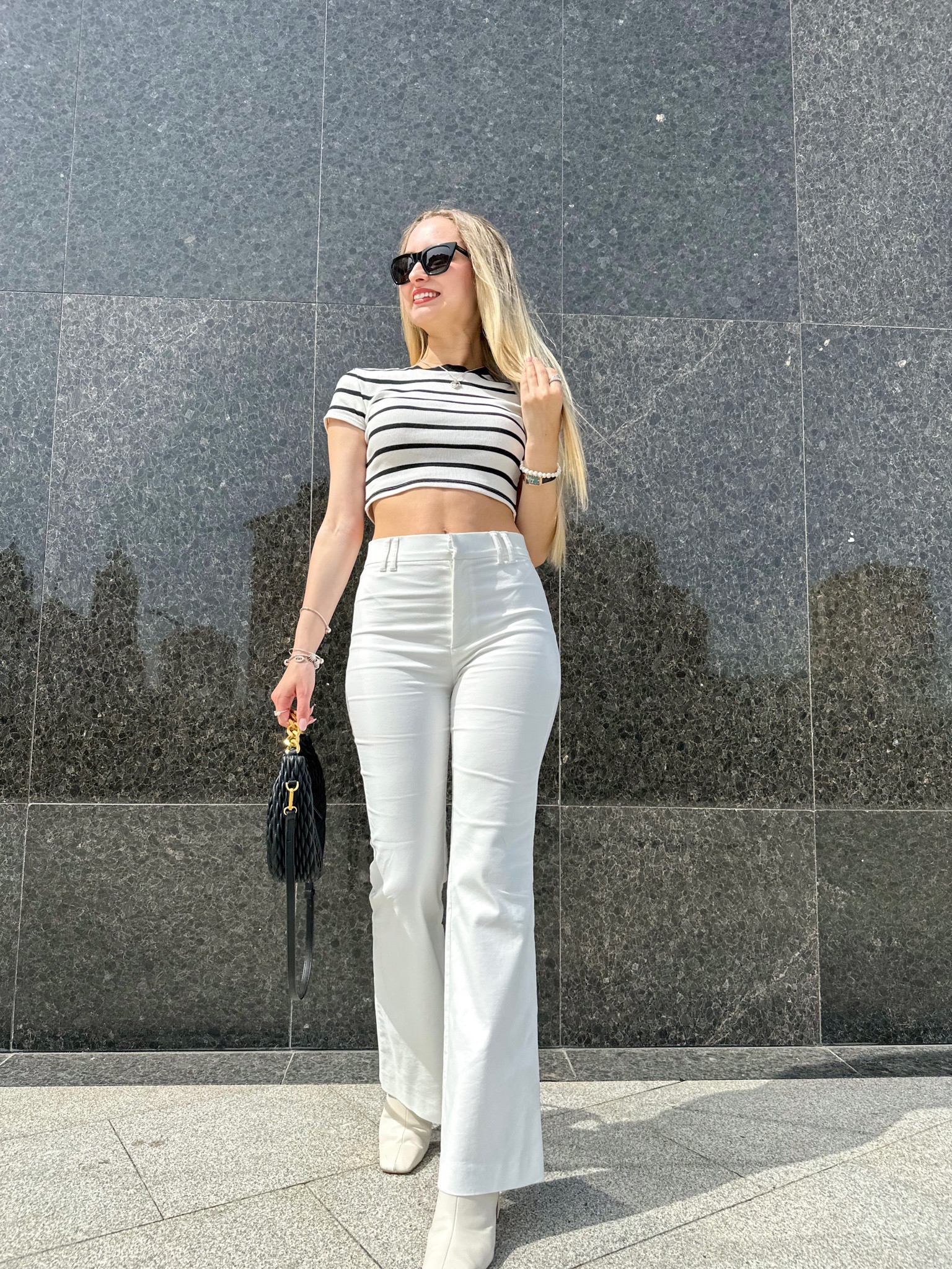 Another neutral look 🫶🏻 Striped top, White pants, White boots, Padded bag and black sunglasses 🤍

#LTKeurope #LTKFind #LTKstyletip