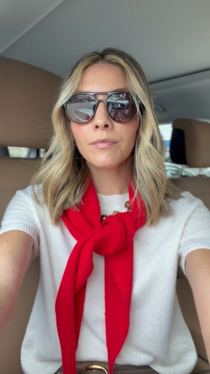 one of my favorite fall outfit formulas lately: a simple neutral base with one really good pop of color. i love the white short sleeve knit + tan trousers together, and throwing the bright red sweater over my shoulders makes the whole thing feel a little more fun without adding any effort.

finished it with a brown belt, gold jewelry + oversized sunnies for an easy outfit that works for errands, lunch, travel days, or basically anything on the calendar.  

 #LTKdayinmylife #LTKgrwm #LTKootd