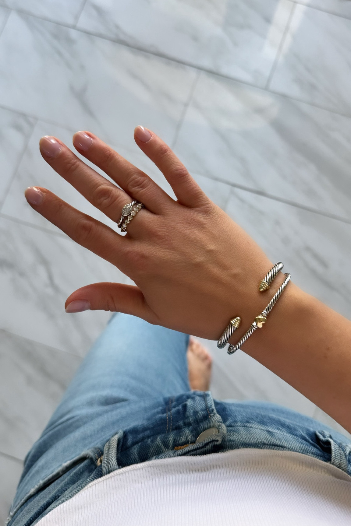 OBSESSED with my new addition 🖤

Size up one on the closed clasp bracelets. My open cable bracelet is a S and the heart is a M.