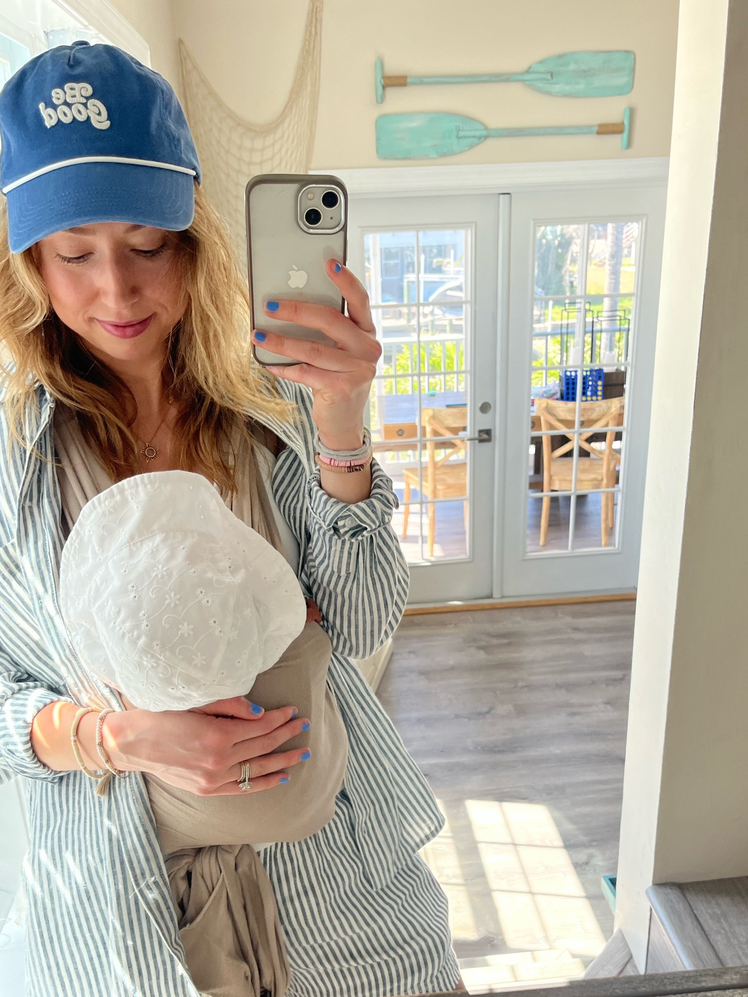 Old navy and target affordable outfit. Spring stripe linen blend shorts and fun colorful hat. New balance sneakers perfect for walking. Easy comfy post partum mom outfit. 

#LTKtravel #LTKSeasonal #LTKfindsunder50