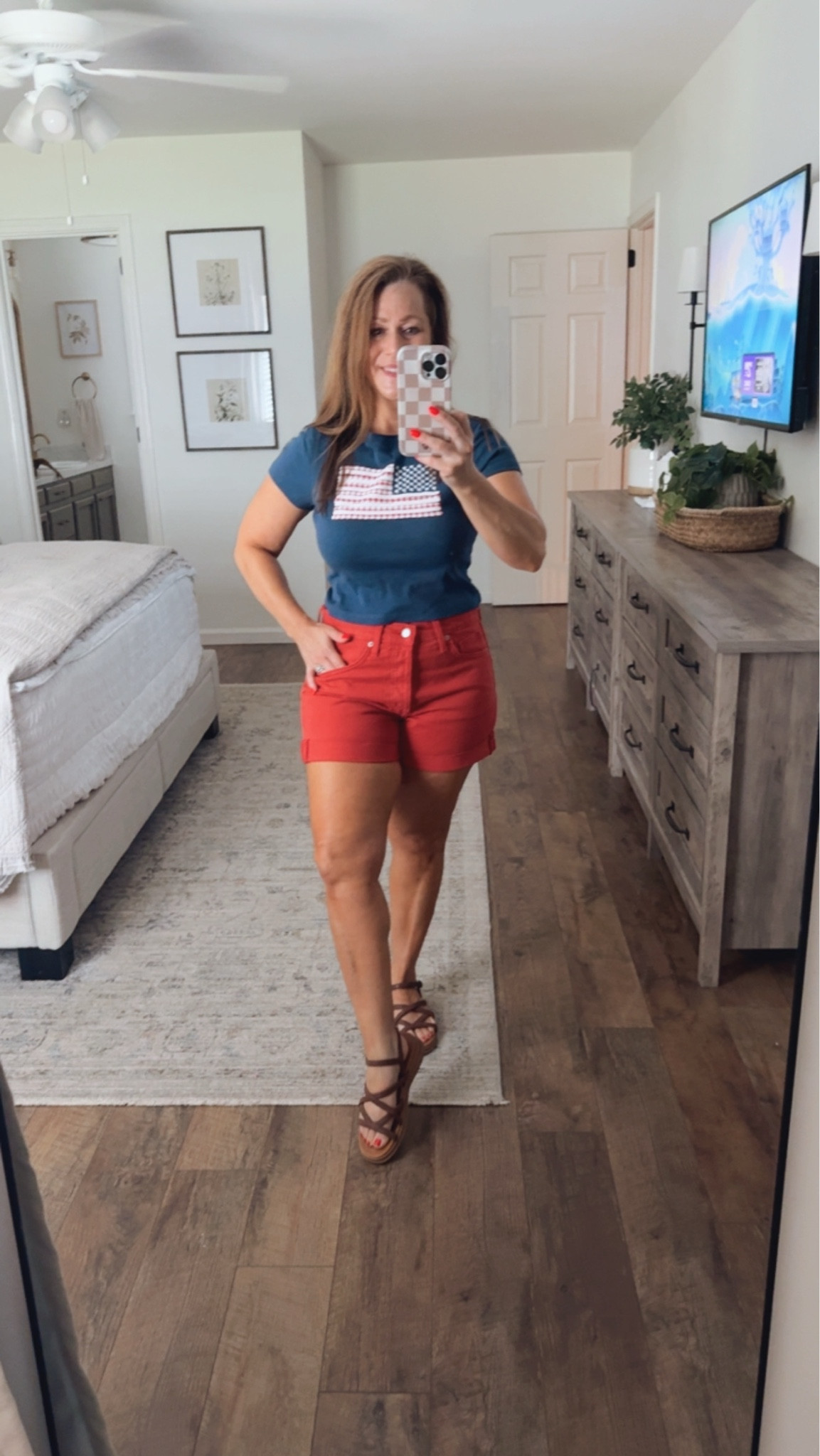 Summer outfit / casual patriotic outfit  

Crop flag T-shirt 
Red denim shorts 
Sandals 

I sized up one- to a medium in the top, wearing my normal size 6 in shorts , sandals TTS

#LTKPetite #LTKMidsize #LTKootd