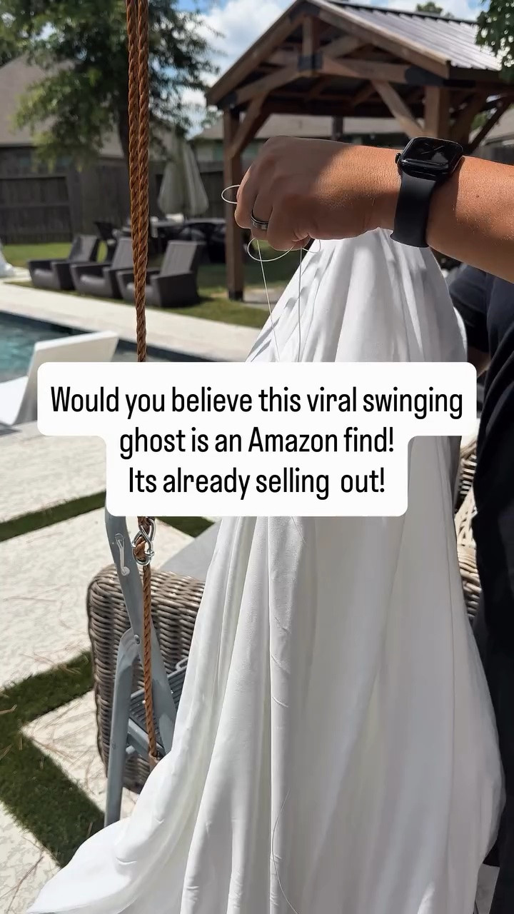 Comment Ghost for links!
Would you believe this viral swinging ghost is an Amazon find that sells out every year?! 
We hung it with fishing line, zip tied the cloth so it looks like it’s holding on, and added twinkle lights for that spooky nighttime glow.
If you’ve been wanting that one must-have Halloween piece, grab it before it disappears again!