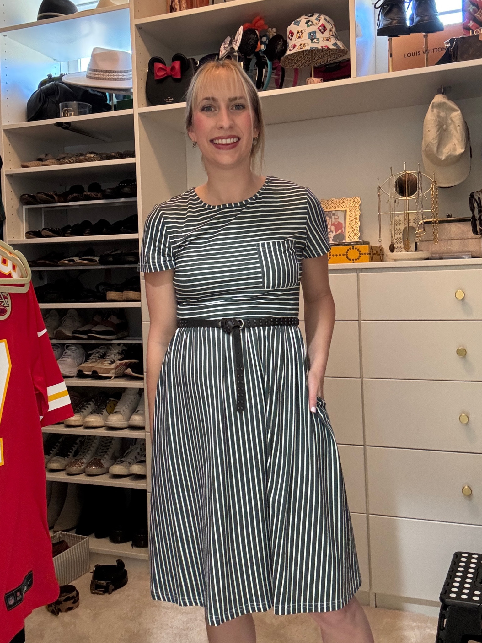 This outfit is a classic and versatile look, combining a striped dress with a belted waist for a flattering silhouette. The black belt adds definition and contrast to the pattern, while the dress’s pockets offer a functional yet stylish touch. The overall vibe is casual chic, perfect for daytime events or errands with a polished edge.

#LTKStyleTip #LTKFindsUnder50 #LTKSaleAlert