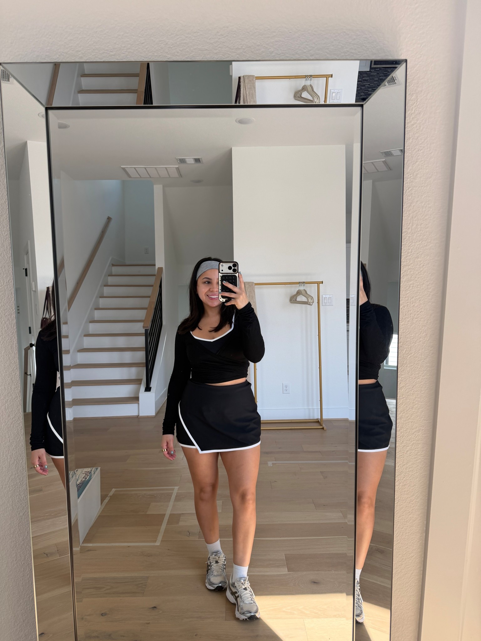 Wrap top: small
Sports bra: small
Skort: small
White socks 
Sneakers: 4.5 men 
Headband 

#LTKgrwm #LTKootd #LTKActive