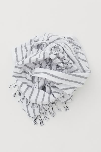 Large Cotton Beach Towel
							
							$24.99 | H&M (US + CA)