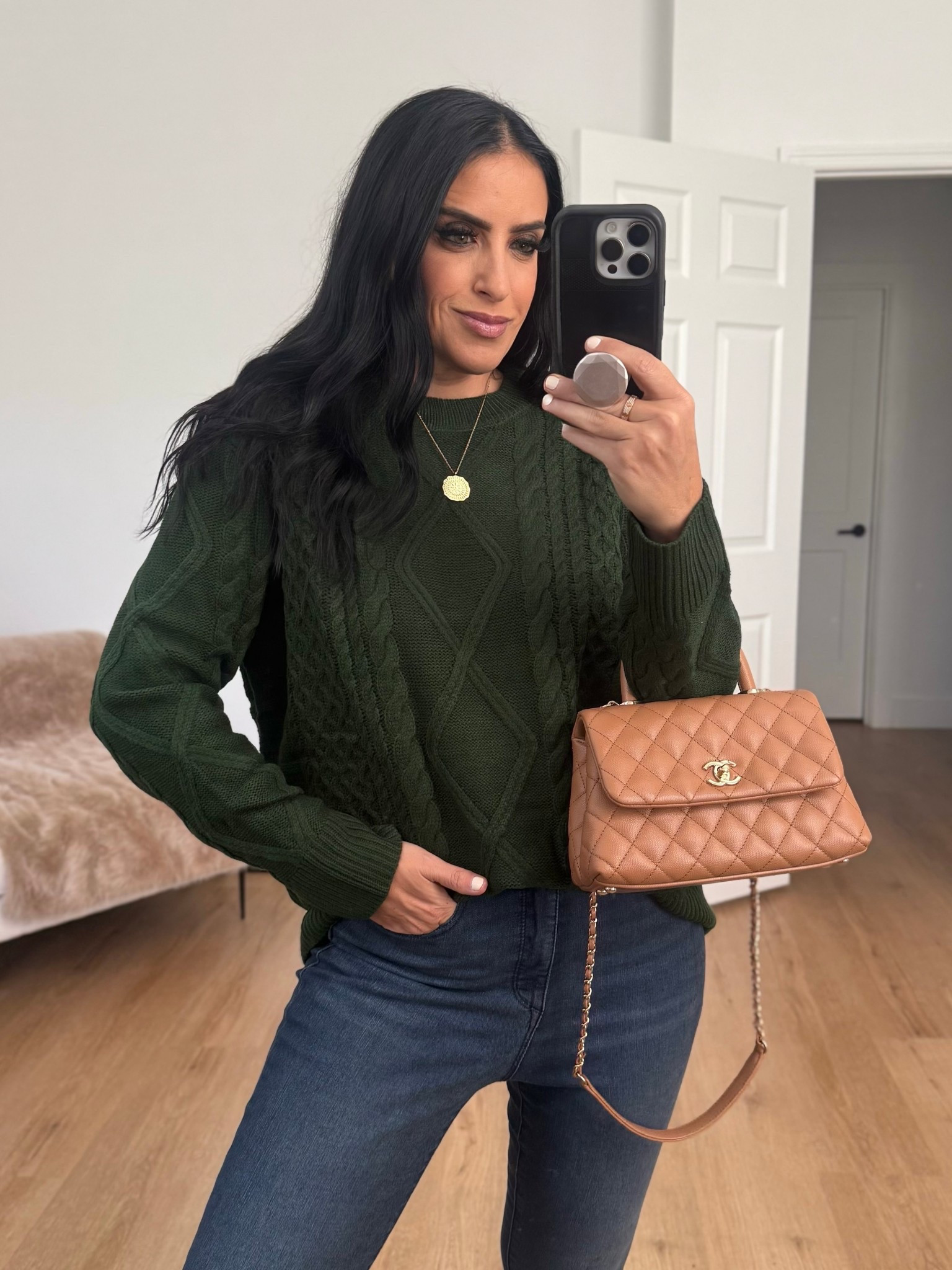 Oversized Cable Knit wearing size medium under $30. 