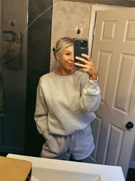 Loving this two piece grey sweatshirt set from Amazon. The high waisted shorts paired with the oversized sweatshirt. So good. Wearing a Small 

#LTKfindsunder50 #LTKfindsunder100 #LTKstyletip