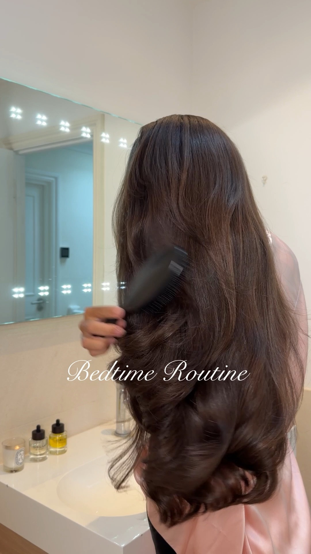 The bedtime hair routine I’ve been doing consistently for years!

1. Gently detangle & apply a few drops of non-greasy hair oil on lengths. It makes my hair so soft, shiny, tames frizz, prevents breakage and split ends.
2. Growth & strengthening scalp serum, it’s water-based so does not make my scalp greasy. Helps to encourage new growth, strengthen & reduce shedding.
3. Brush to evenly distribute serum and follow with a massage. This helps stimulate blood flow to hair follicles which promotes healthier hair growth and thickness.
4. Sleep with a silk cap to reduce friction and moisture absorption against your pillowcase. This will help tame frizz, enhance shine, reduce dryness, breakage and lock in moisture which leaves hair softer and smoother.

#LTKBeauty