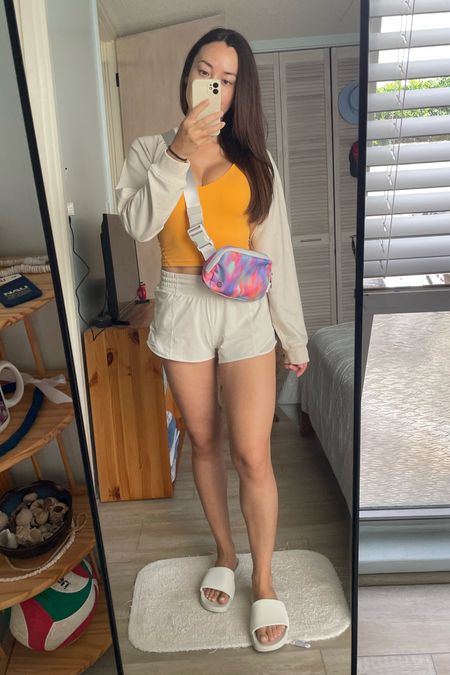 Cute casual Athleisure summer outfit from lululemon.  

This Everywhere Belt Bag adds the perfect pop of color and this top in the color Mango Dream adds even more sunshine to my day ☀️

This top is currently on sale in lululemon WMTM!  

#LTKstyletip #LTKsalealert #LTKSeasonal
