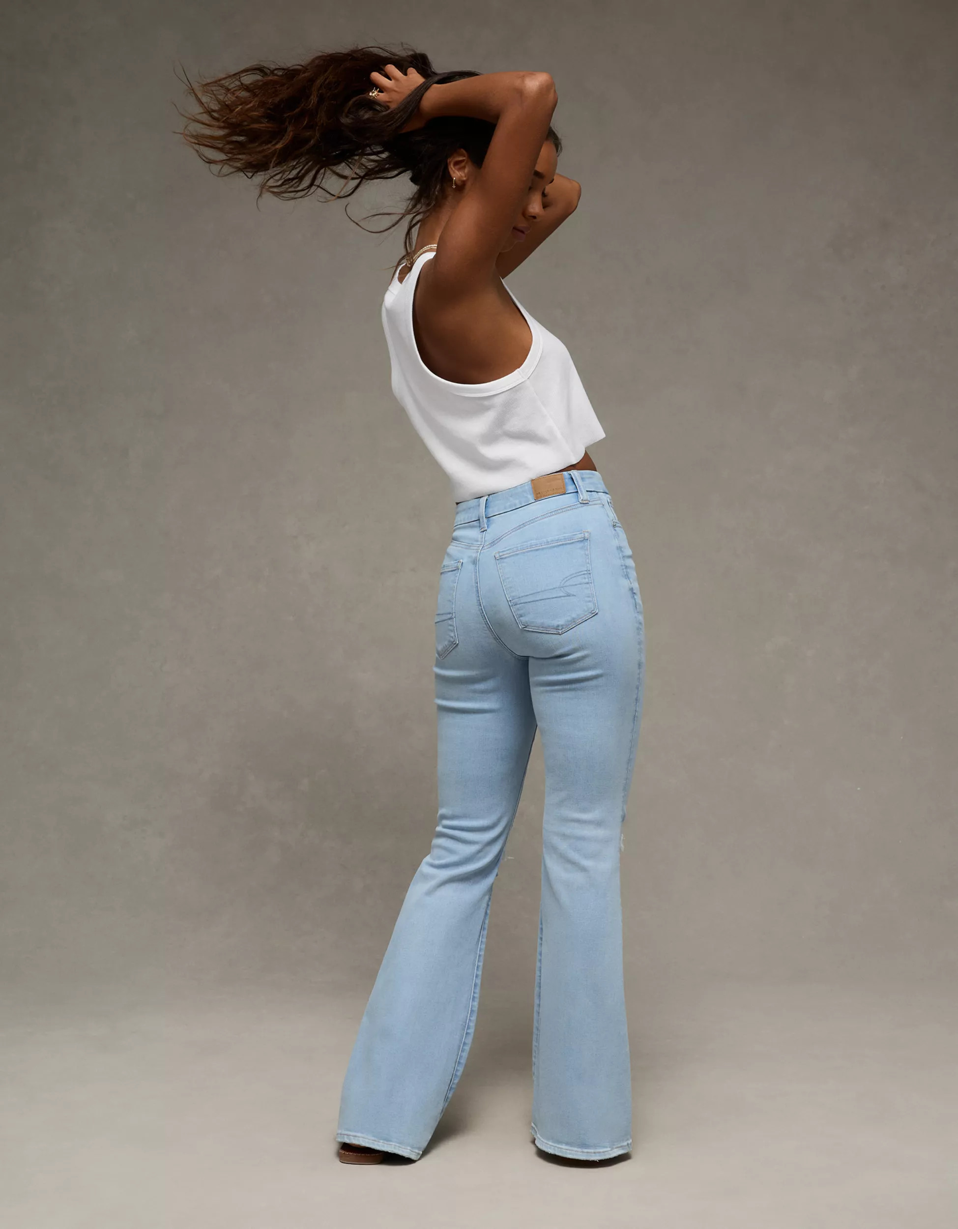 AE Next Level Curvy Ripped Super High-Waisted Flare Jean | American Eagle Outfitters (US & CA)