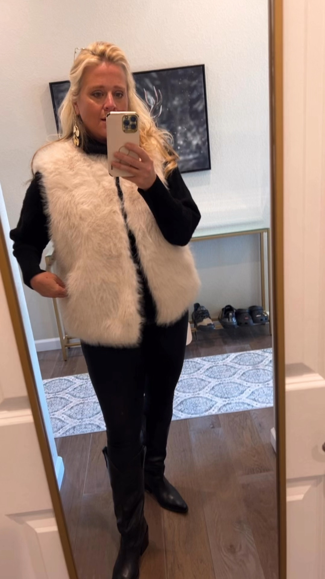 ✨Tap the bell above for daily look good, feel good style inspiration and luxury looks for less.

Walmart white faux fur vest

Here are five more places a woman over 40 can wear a white faux fur vest outfit, separated by commas:

Art gallery opening, charity gala, winter concert, upscale shopping trip, après-ski gathering

To elaborate on these options:

## Art Gallery Opening

Pair the white faux fur vest with a sleek black turtleneck, wide-leg trousers, and statement jewelry for an artsy yet sophisticated look.

## Charity Gala

Layer the vest over a floor-length gown in a rich color like emerald or burgundy, adding elegance and warmth to your formal attire.

## Winter Concert

Combine the vest with a leather jacket, dark jeans, and ankle boots for a rock-chic ensemble perfect for an indoor or outdoor winter music event.

## Upscale Shopping Trip

Wear the vest over a cashmere sweater, tailored pants, and comfortable yet stylish flats for a luxurious look while browsing high-end boutiques.

## Après-Ski Gathering

For a cozy post-skiing social event, layer the vest over a Fair Isle sweater, paired with slim-fit ski pants and fur-lined boots for a chic mountain-inspired outfit.

These additional options showcase the versatility of a white faux fur vest, allowing a woman over 40 to incorporate this stylish piece into various aspects of her social and cultural life.




#LTKOver40 #LTKParties #LTKMidsize