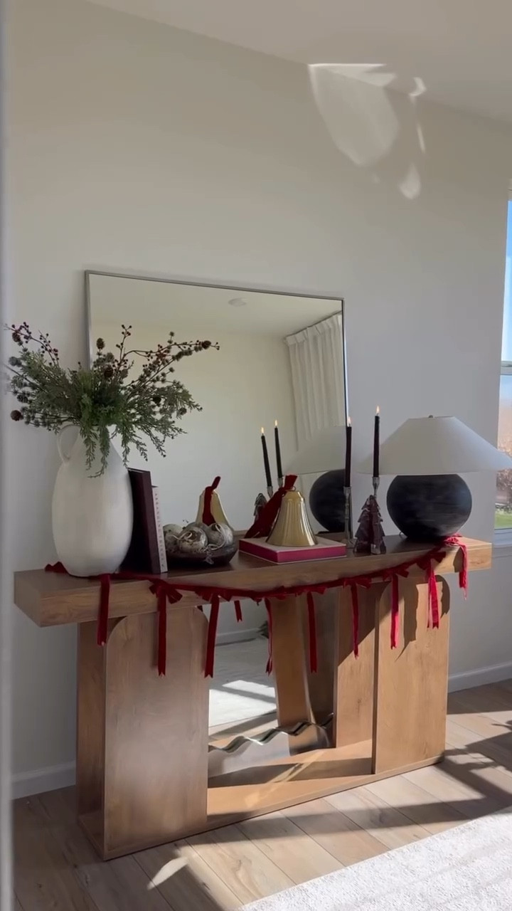 ✨the prettiest holiday console styling ✨can you believe this console table is under $180? the arched detail adds so much character so I kept the decor minimal this season by just adding beautiful touches like the bow garland, candles and a few cozy touches to make it festive.

#consoletablestyling #redchristmas #holidaydecorations #amazonhome #amazonbestseller #christmasfinds #holidaydecor #amazonholiday #holidayseason  

#LTKSeasonal #LTKFindsUnder100 #LTKHoliday