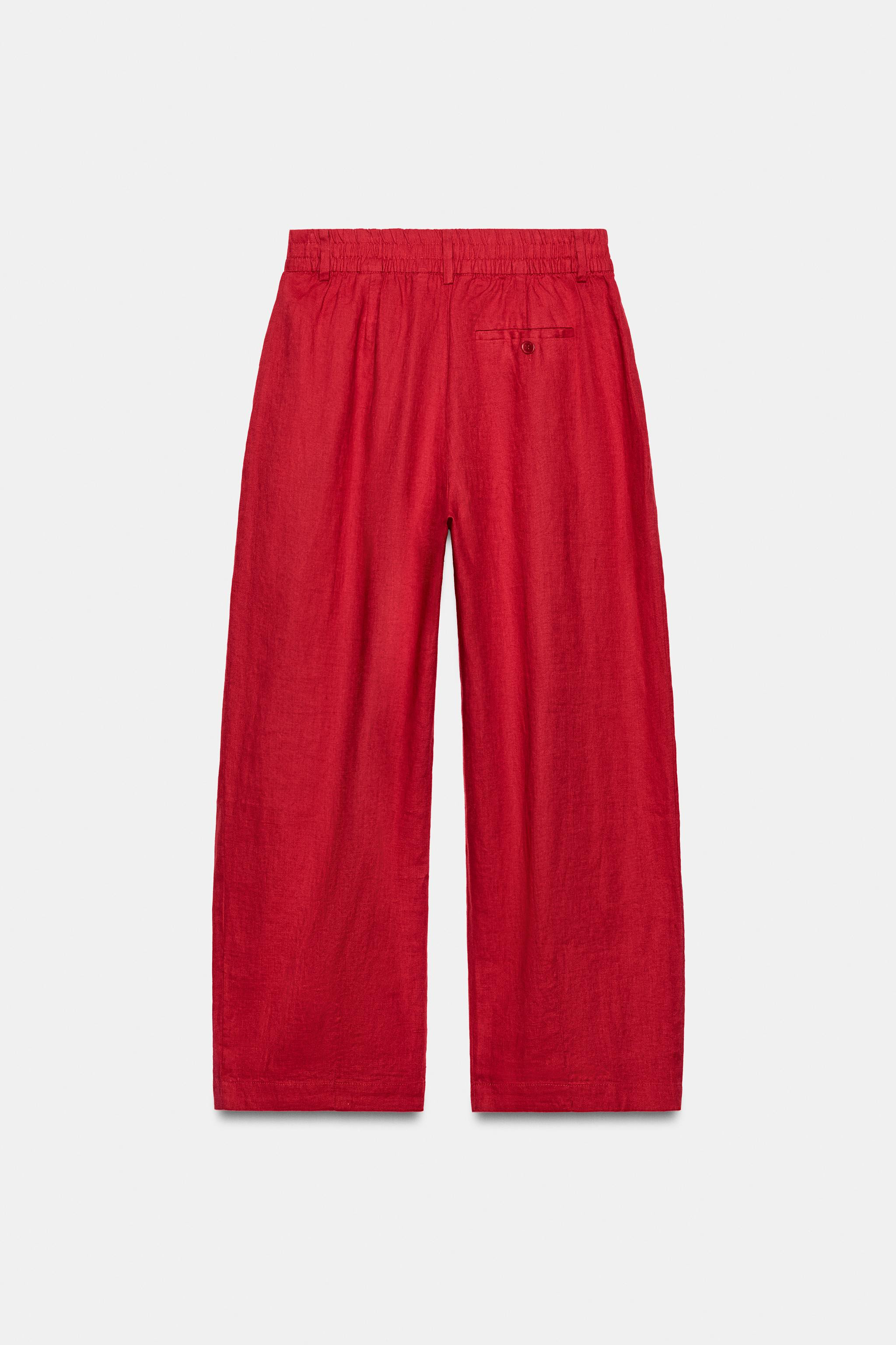 ZARA WOMAN COLLECTIONTrousers made from 100% linen yarn. Mid-waist and elasticated waistband with... | Zara UK