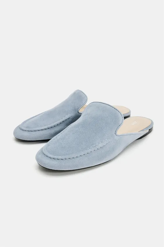 Soft suede loafer mules. Features a raised vamp and front stitching detail. Finished with a round... | Zara US