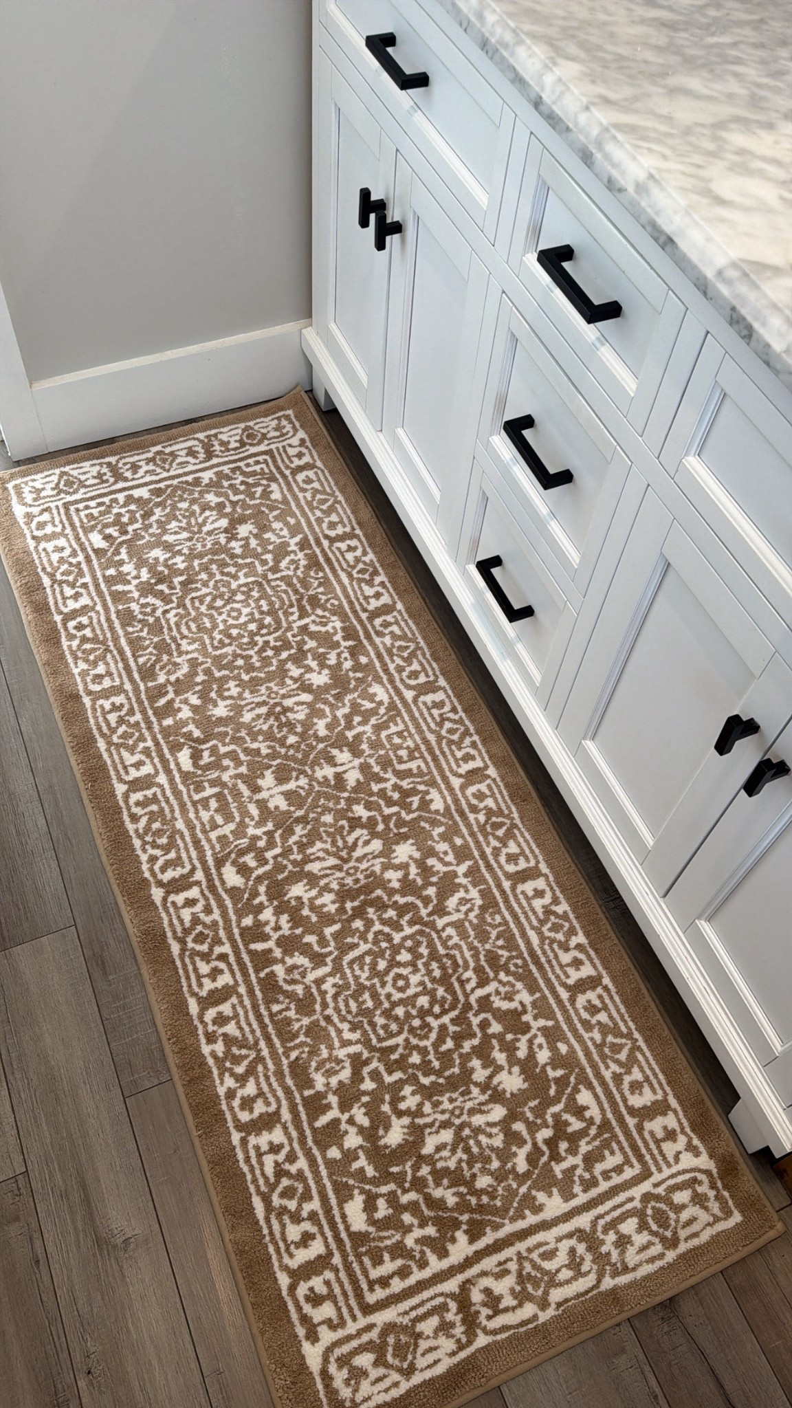 This Walmart bathroom runner instantly elevated the space 🤎 Loving the neutral pattern, soft feel, and the price point is so good. Such an easy home refresh.

#LTKOver40 #LTKmomlife #LTKHome