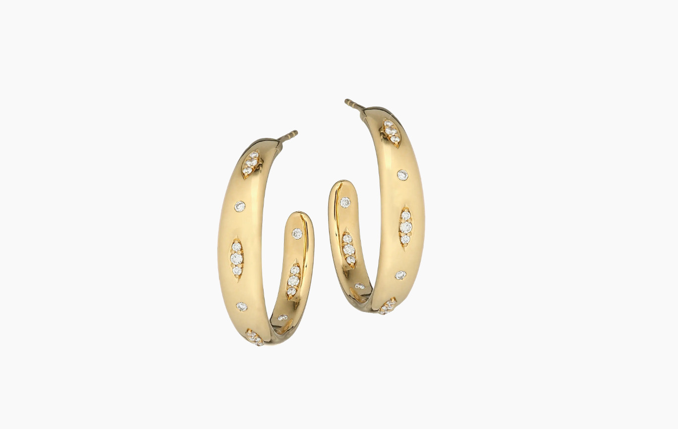 Elevate your jewelry collection with these Gypsy large hoop earrings from Tamara Comolli. Crafted in 18K yellow gold with diamond pavé detailing, these hoops bring bold elegance and sparkle to any look—perfect for day or night.

✨ Tap to shop these luxury earrings & save for your jewelry inspo 

 #LTKgrwm #LTKootd #LTKvlog