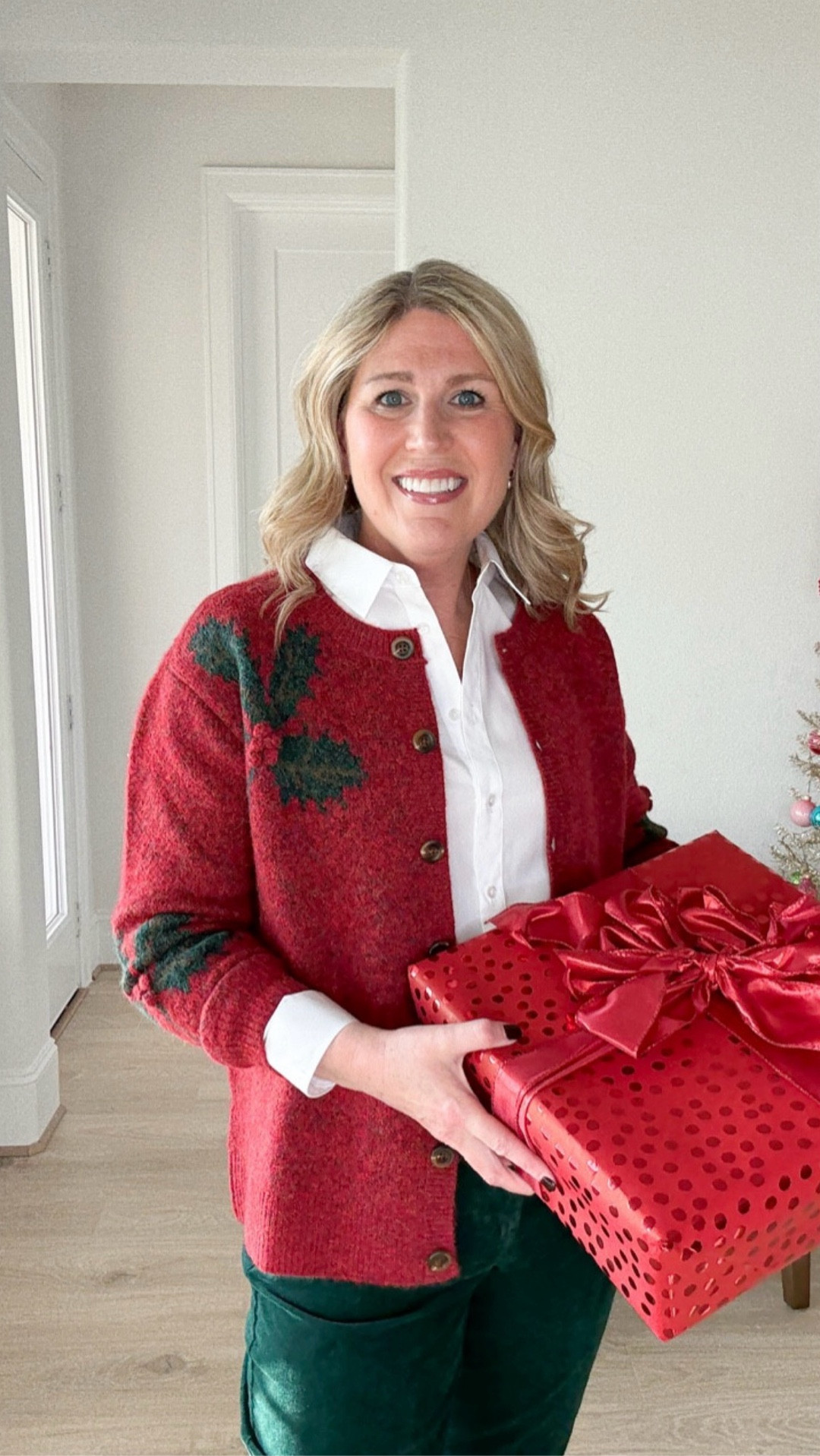 Holiday style made easy ✨ 
Because getting dressed for December shouldn’t feel like a full-time job.

This simple combo — a festive cardigan, crisp white button-up, plush corduroy pants, and classic flats — is my go-to when I want to look put together without overthinking it.
Comfortable. Polished. Festive enough for every gathering from coffee dates to casual celebrations. ❤️

If you love effortless holiday style that still feels elevated, tell me: Are you team festive cardigan or team classic neutrals this season? 🎄💬

#LTKWatchNow #LTKShoeCrush 

#LTKSaleAlert #LTKMidsize #LTKPetite #LTKPlusSize #LTKFindsUnder100 #LTKTravel #LTKOver40 #LTKSeasonal #LTKWorkwear #LTKGiftGuide #LTKHoliday