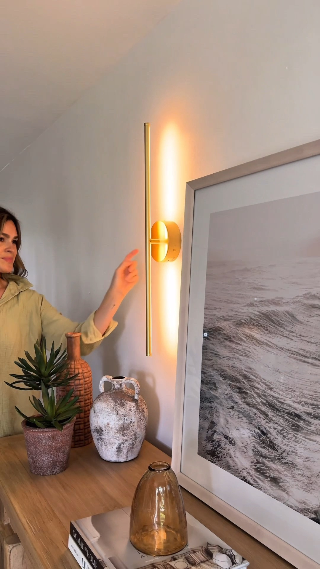 This Amazon lighting find totally transformed the space!

I styled this wall for a modern Mediterranean feel and I cannot get over how it came together! These wireless lights are a game changer.

✔️Rechargeable
✔️Dimmable
✔️Built in timer
✔️3 light settings to choose from

#wirelesslighting #wirelesslight #batteryoperatedlights #neutralhomedecor

#LTKSaleAlert #LTKHome #LTKOver40