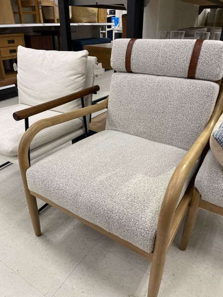 This new boucle upholstered wood arm chair with leather accents is new for Fall from Hearth and Hand. Bring comfortable seating to your indoor space with this Boucle Upholstered Wood Arm Chair from Hearth & Hand™ with Magnolia. Crafted from rubberwood material, this stylish armchair coordinates well with any decor theme and color palettes. Boucle fabric upholstery gives the chair a comfortable surface, while the generously stuffed removable padded seat and back cushion with headrest make the chair extra inviting. Add a textured or printed pillow for an appealing touch of contrast.

#LTKSeasonal #LTKhome #LTKFind