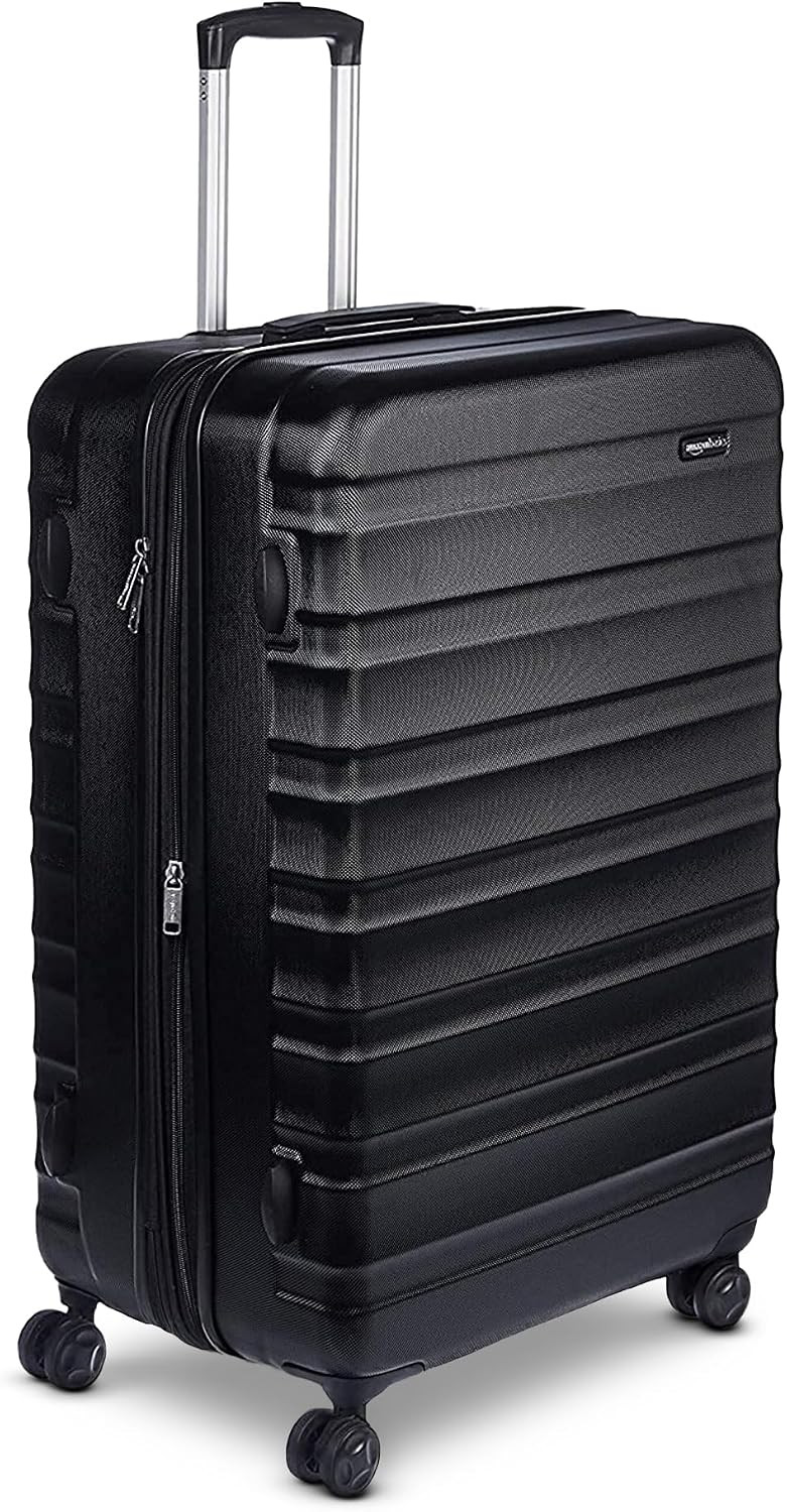 Amazon Basics 30" Hardside Large Checked Luggage, Hardshell Suitcase With Four Multi-directional Wheels, Expandable For Up to 15% More Space, Scratch-Resistant Shell, Black | Amazon (US)