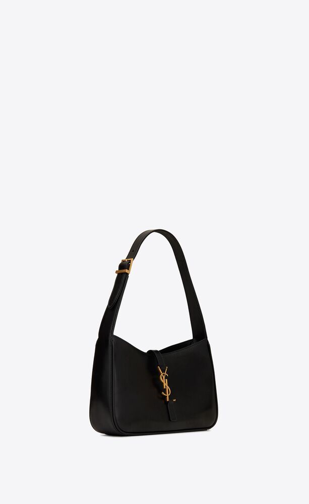 saint laurent monogram hobo bag with an adjustable strap and tab closure with metal YSL hook. | Saint Laurent Inc. (Global)