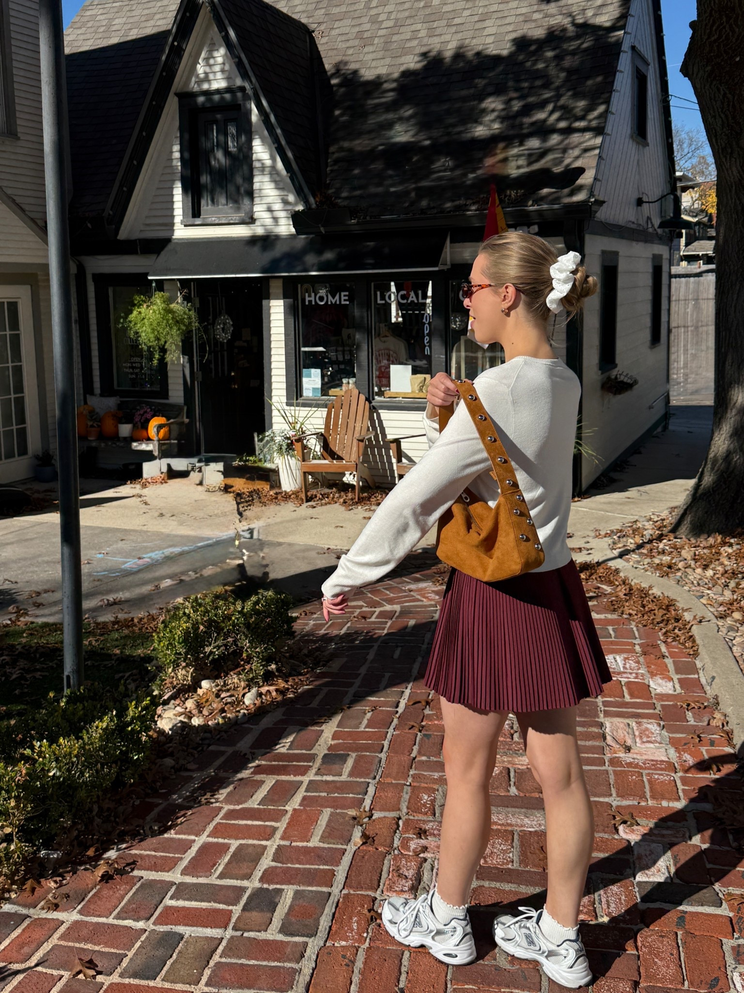 Wearing size M in my H&M cardigan. Also have it in pink in a size S & I prefer the S, so just depends on if you want a looser fit or not. Comes in the prettiest red color rn for the holidays
Target skort is sold out, but I linked similar! 
Target purse & earrings 
New Balance 530s - I go up half size
Amazon scrunchie, sunglasses & socks

#LTKFindsUnder50 #LTKootd