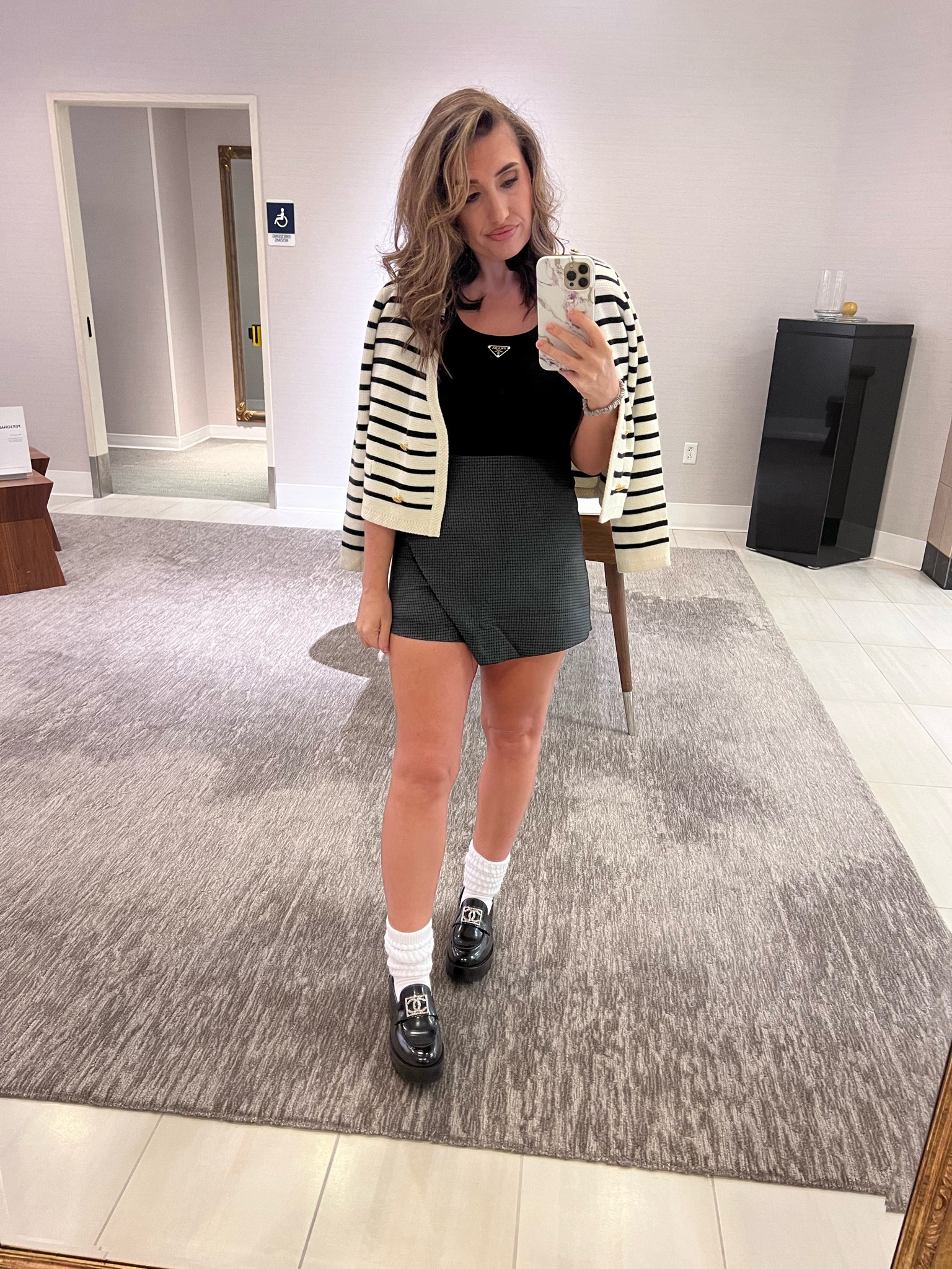 Loafers, high socks, skorts, Parisian style, striped cardigan 

#LTKstyletip #LTKeurope #LTKfindsunder50