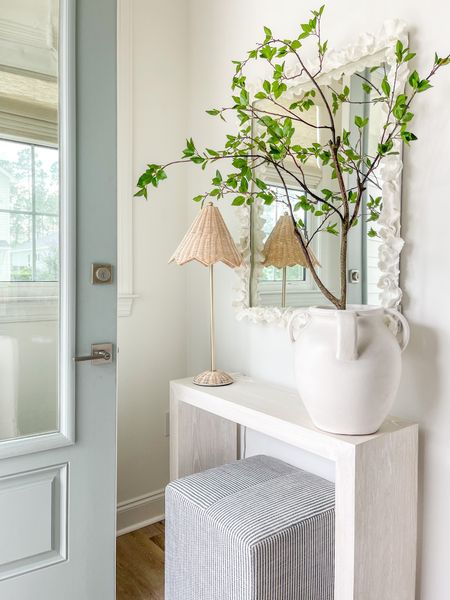 Summer greenery in our Florida entryway! We love this small console table, striped stool, coral mirror, and rattan lamp. I placed the small tree in my favorite white vase to look like a fresh cut tree branch!
.
#ltkhome #ltksalealert #ltkseasonal #ltkunder50 #ltkunder100 #ltkstyletip

#LTKSeasonal #LTKhome #LTKsalealert