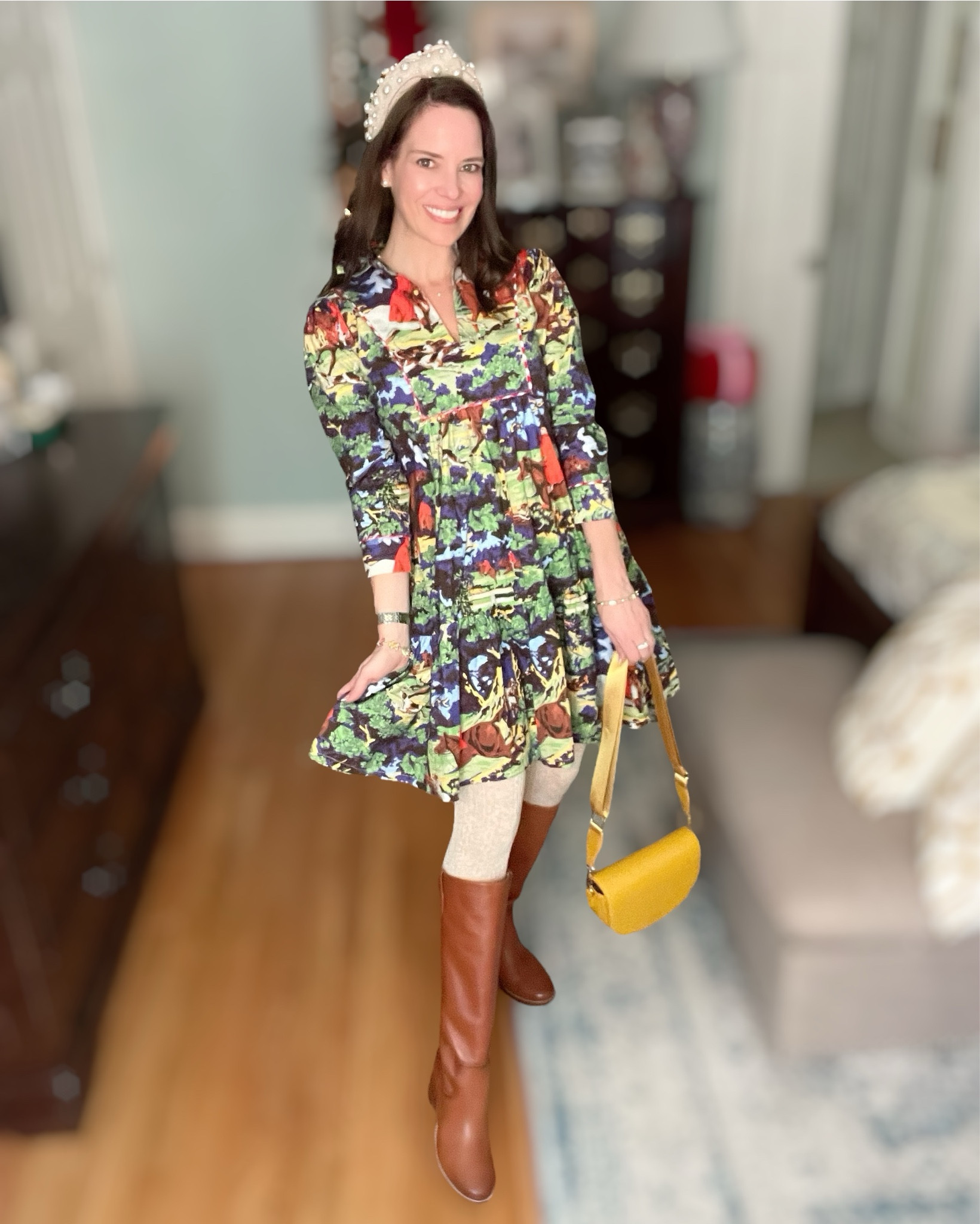 This Foxhall© Pippa Long dress from House of MBR feels like the most magical woodland storybook scene 😍🍂 The deep autumn palette + painterly farm print is chef’s kiss for Thanksgiving gatherings, fall family photos, and festive hosting days where you still want to be comfy.
I paired it with the Target cable sweater tights for warmth and the Nine West Hecee riding boots — such a great classic tall boot shape with that timeless cognac tone 🤎
I topped it with the iconic Lele Sadoughi pearl headband for a soft holiday sparkle ✨ And the mustard Luna crossbody adds the happiest fall pop of color ☀️

Everything feels polished but still wearable — you can cook, host, eat, play with the littles, and still feel cute. 🥰

• Dress: House of MBR Foxhall© Pippa Long
• Tights: cozy sweater cable tights (Target)
• Boots: Nine West Hecee Riding Boots
• Headband: Lele Sadoughi Ivory Pearl
• Bag: Kedzie Luna Crossbody (so lightweight + under $60!)
• Pearl studs + two-tone watch finish the look ✨

⸻

preppy thanksgiving outfit • colorful fall dress outfit • riding boots outfit • holiday hosting style • fall family gathering outfit • comfortable thanksgiving look • coastal preppy wardrobe • classic timeless fall outfit • pearl headband outfit • hostess outfit ideas 🍁🦃💛

#LTKHoliday #LTKItBag #LTKShoeCrush